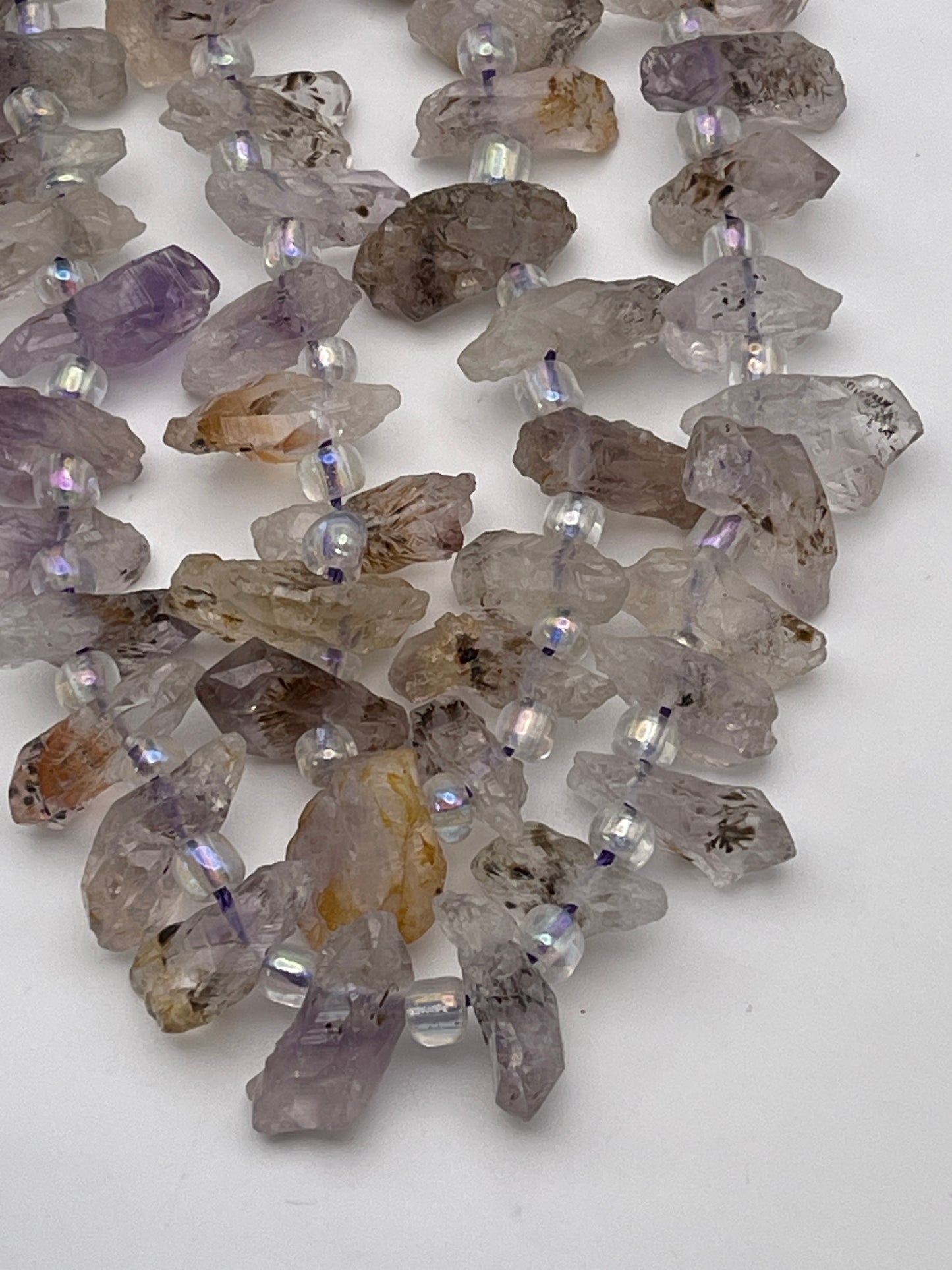 Super Seven Rough Point Bead Strand.