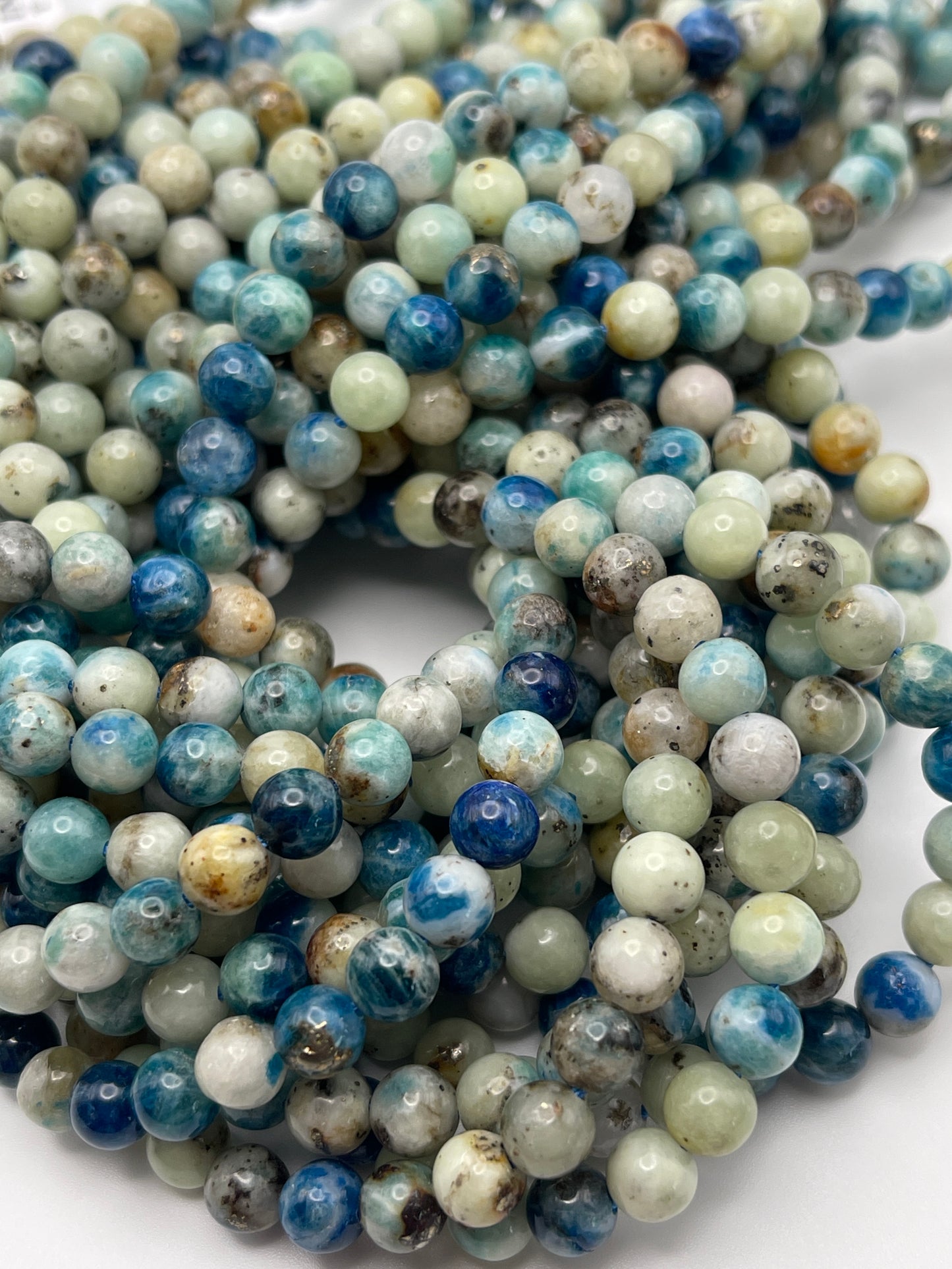 6mm Pyrite in Dioptase Round