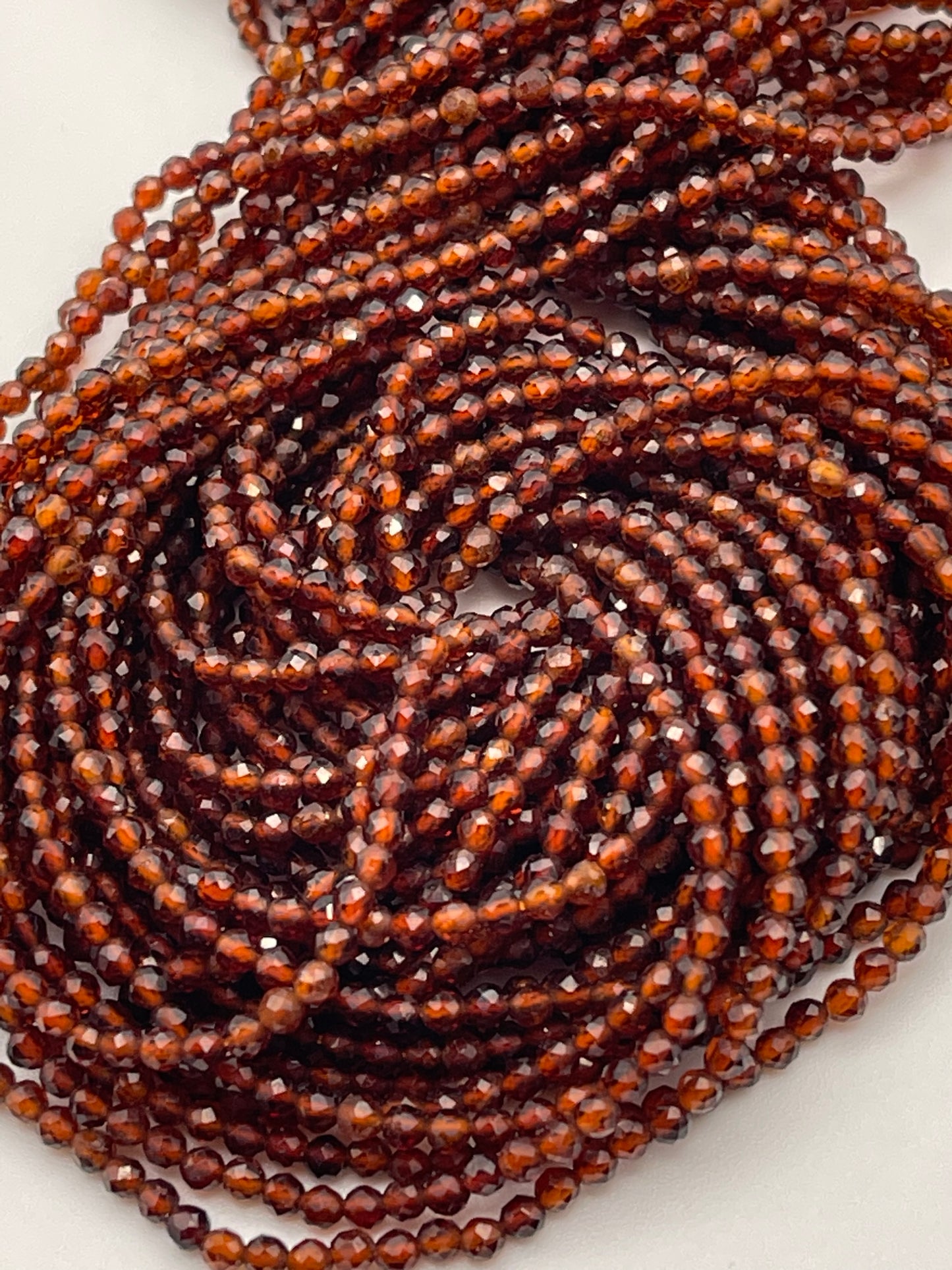 2mm Faceted Hessonite Garnet Bead Strand.