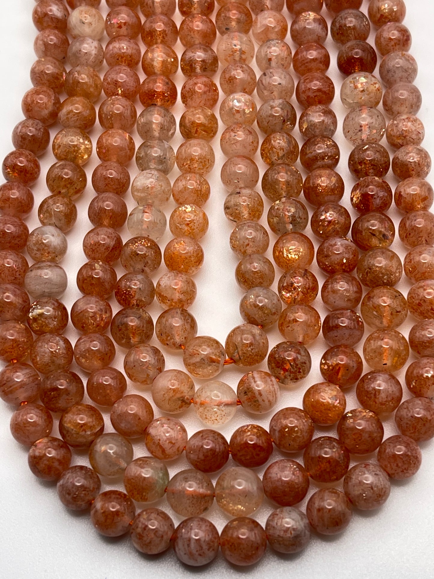 7mm Sunstone AA Round Smooth Bead Strand.