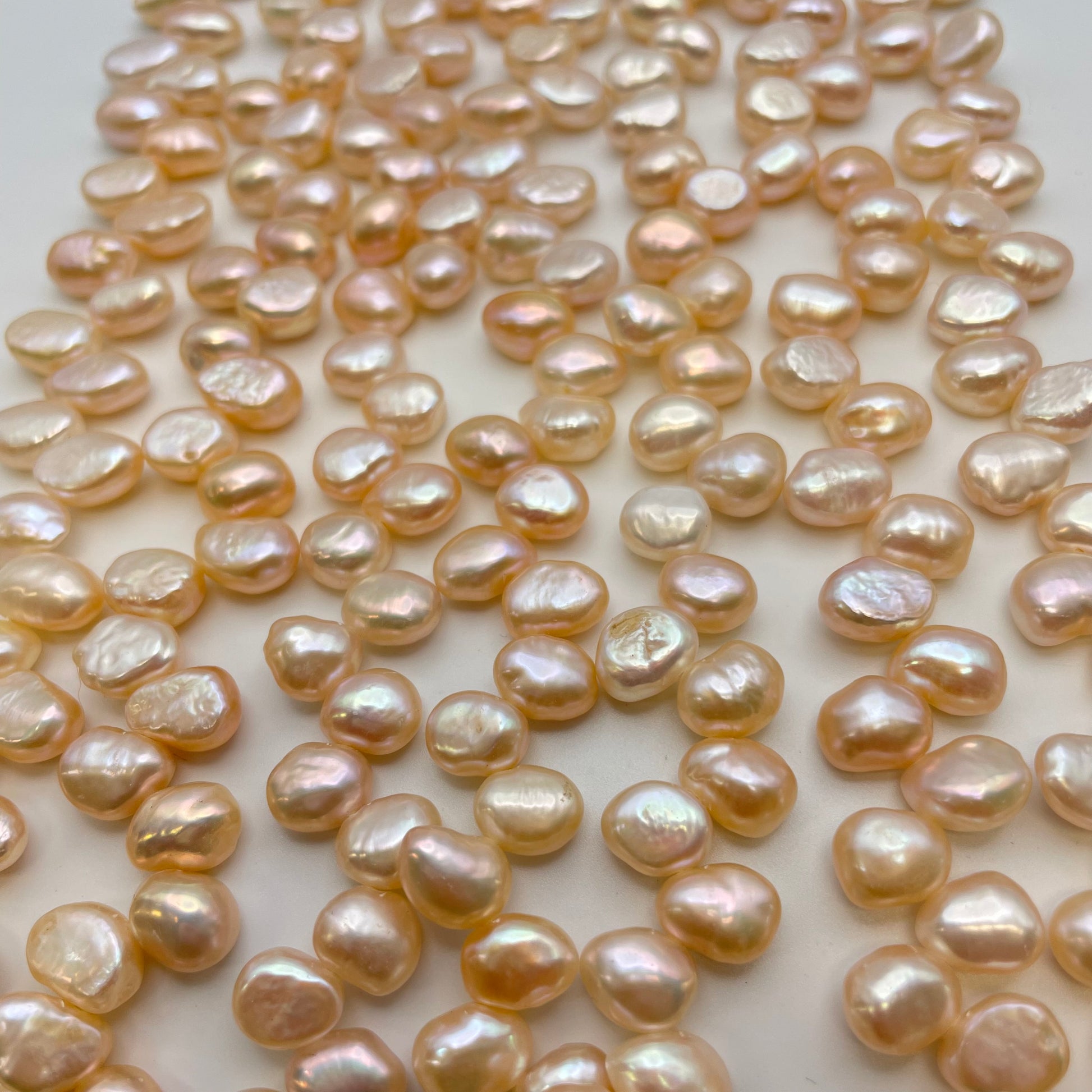 8mm Pink Pearl Dancing Top Drill Strand