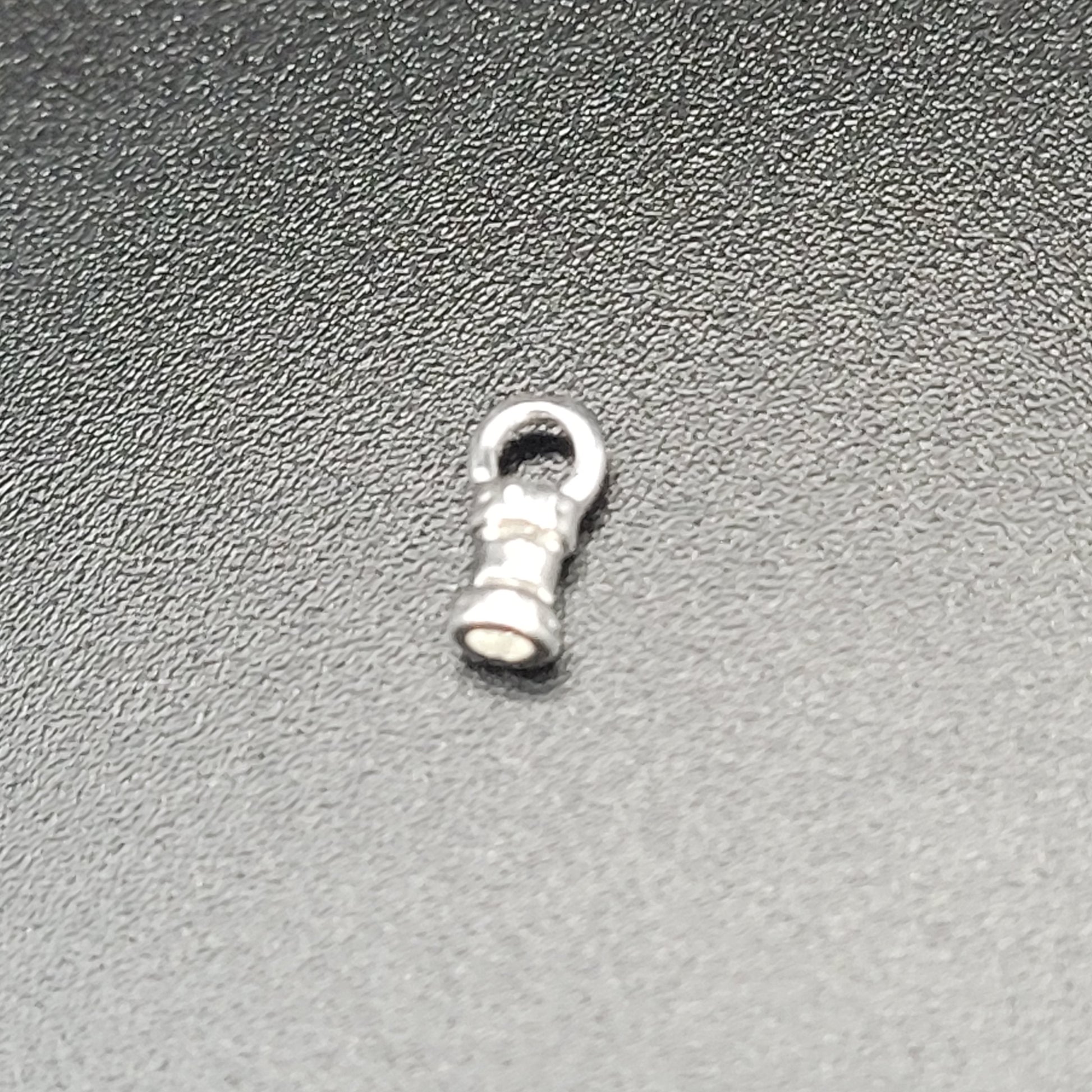 1.5MM SILVER CRIMP END 7.4X2.9MM.