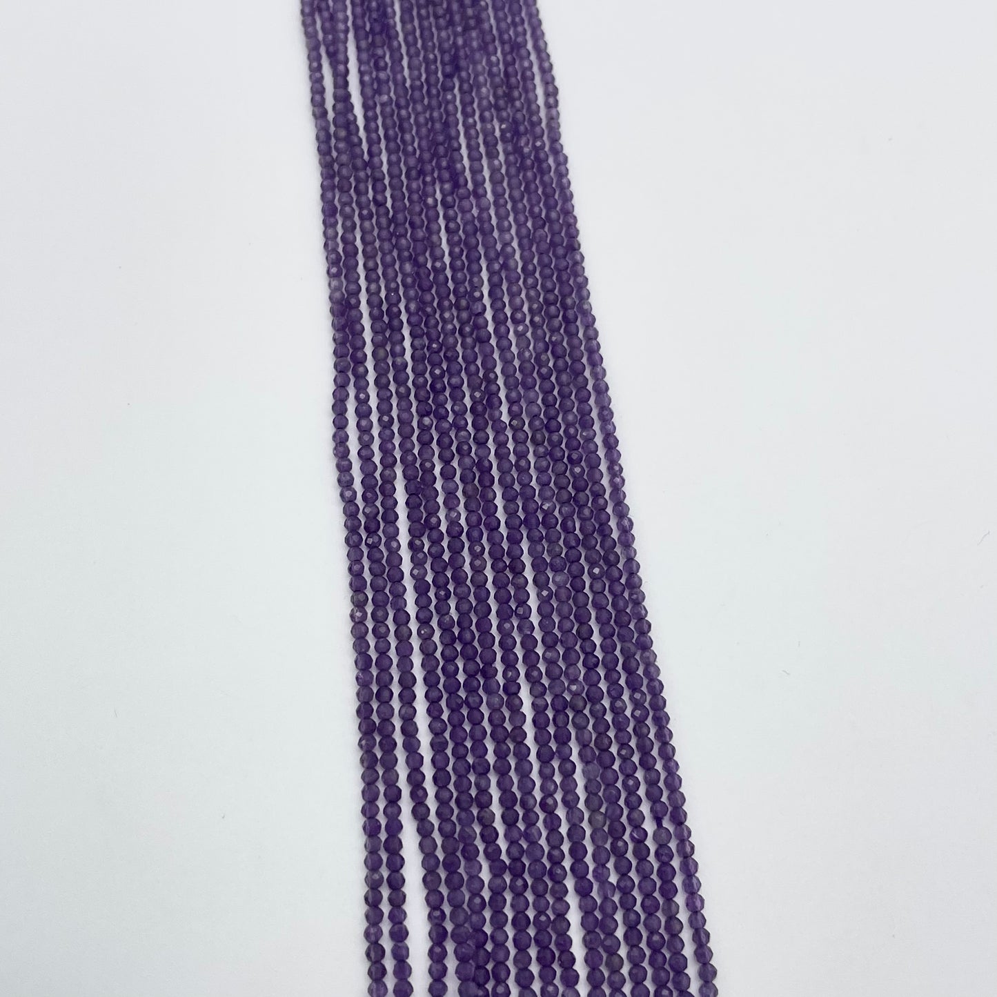 1.5mm Amethyst Round Faceted Bead Strand.