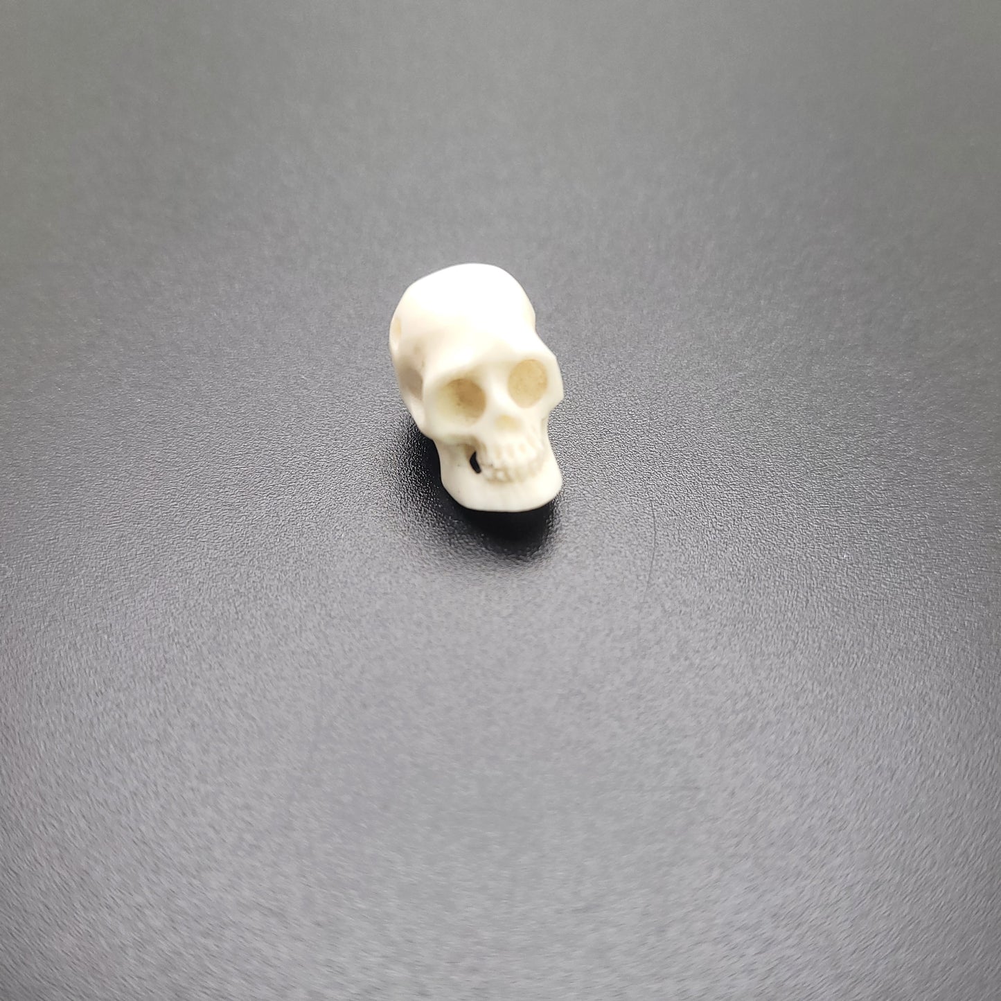 10mm-12mm Small White Carved Bone Skull Single Bead.
