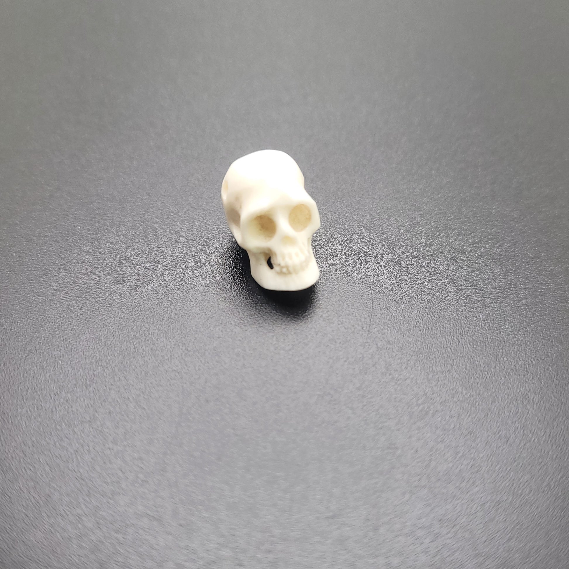10mm-12mm Small White Carved Bone Skull Single Bead.