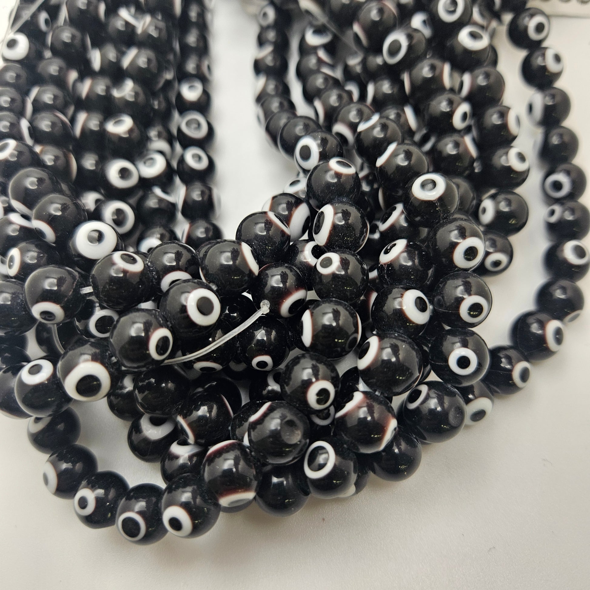 10mm Black Evil Eye Bead Strand.