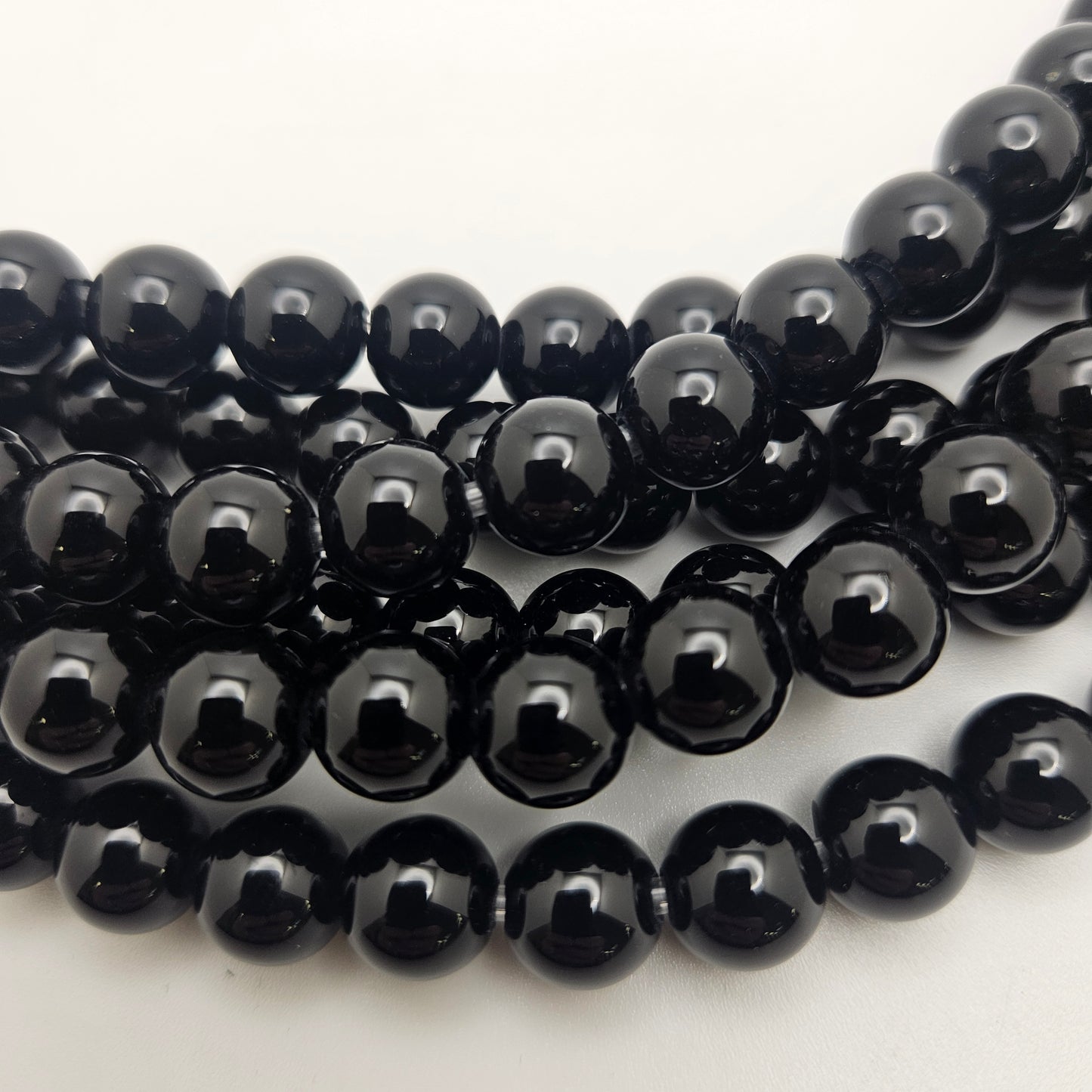 10mm Black Onyx Large Hole Round Bead Strand.