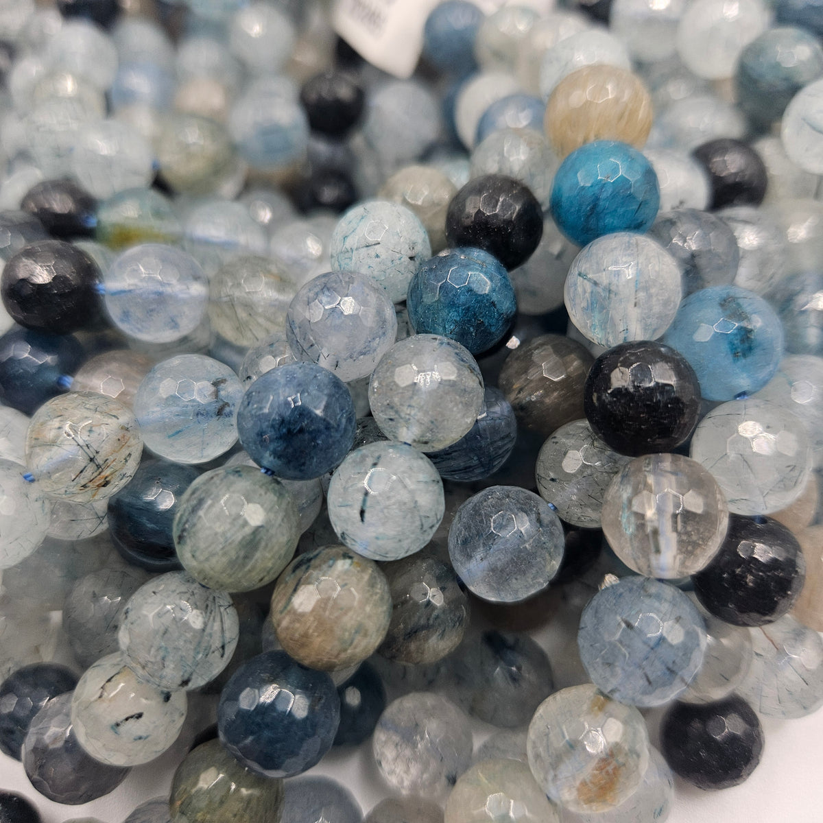 10mm Faceted Blue Rutilated Quartz Bead Strand.