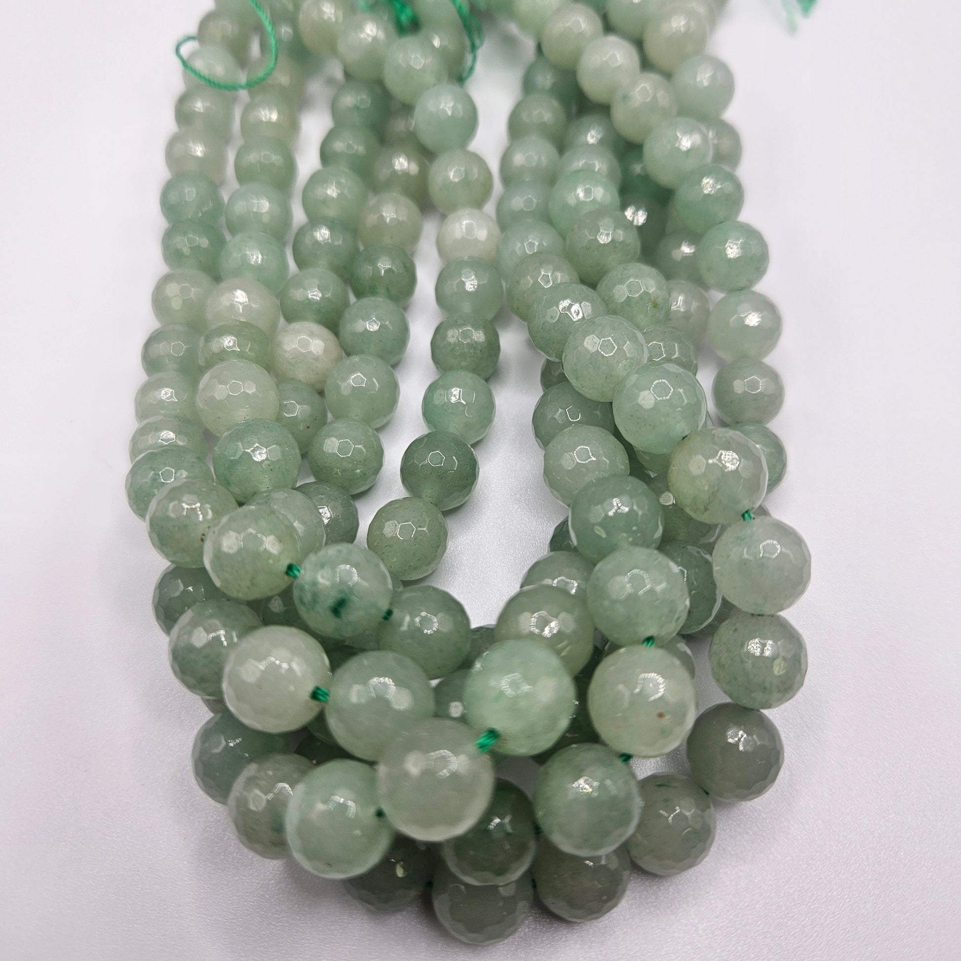 10mm Faceted Green Aventurine Round Bead Strand.