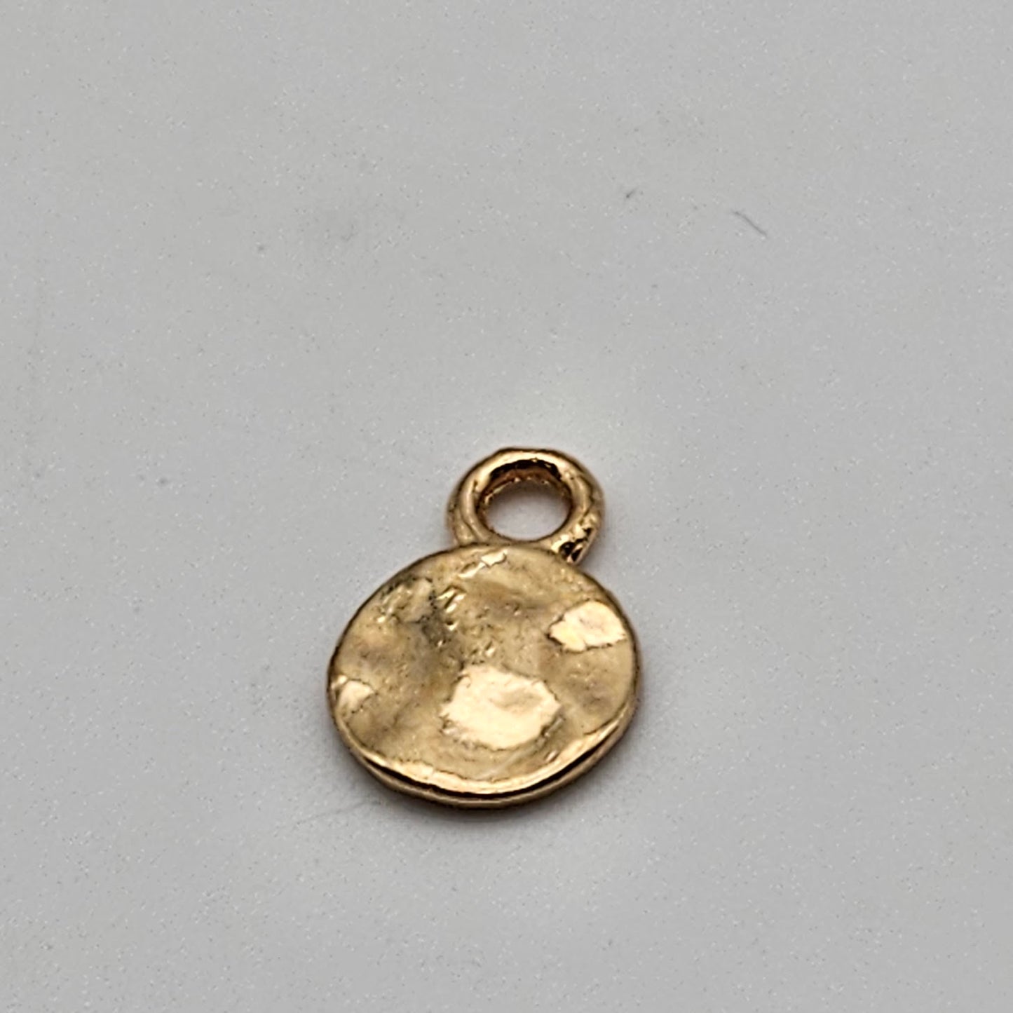 10mm Gold Colored Pewter Hammered Charm.