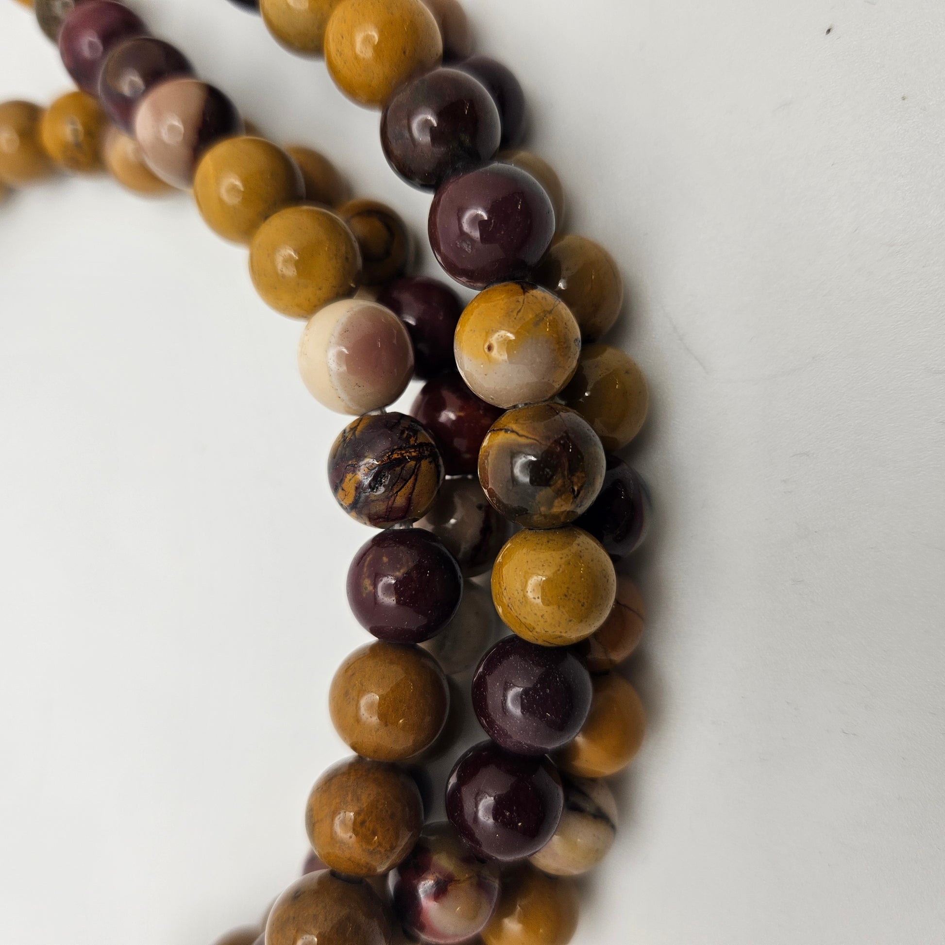 10mm Mookaite Jasper Large Hole Round Bead Strand.