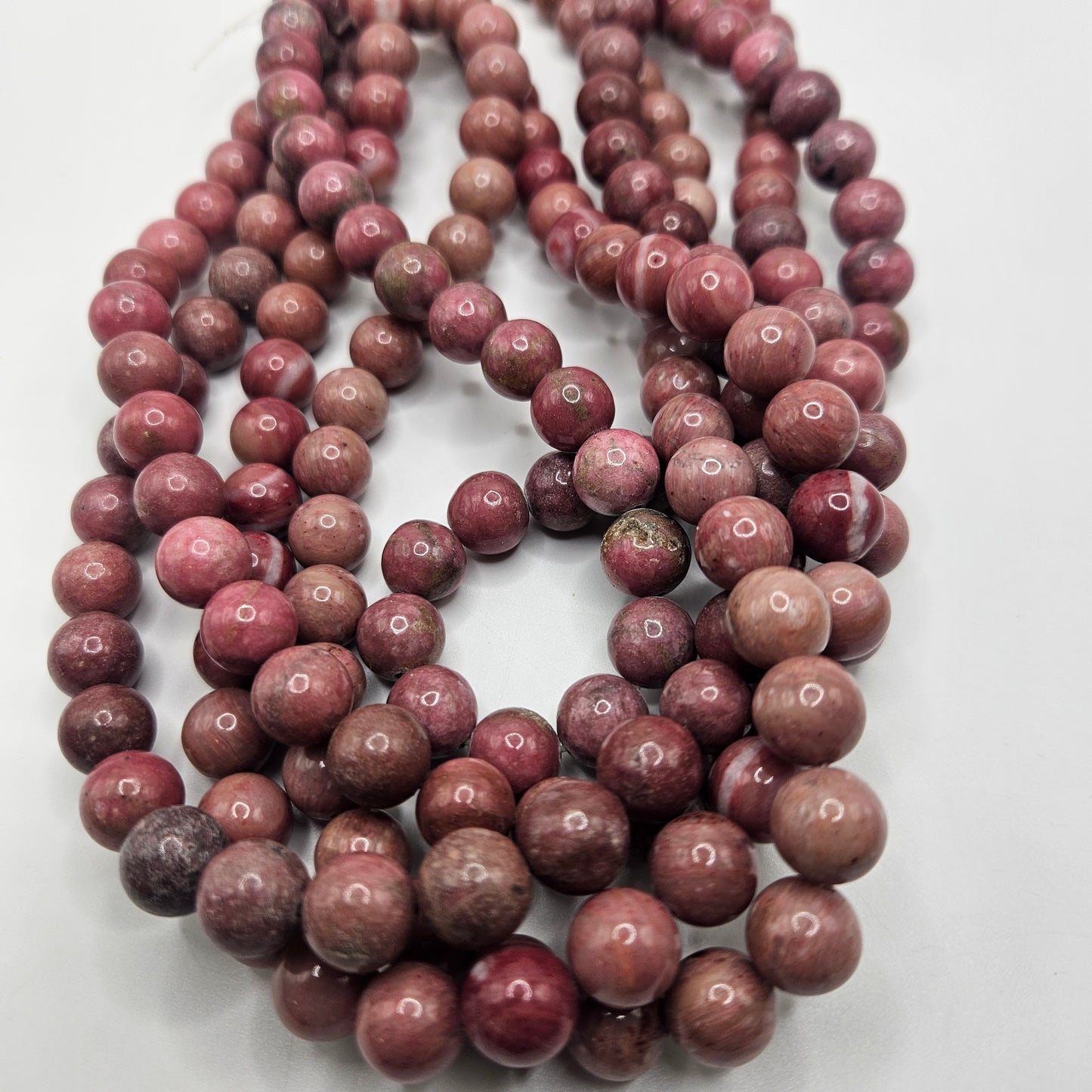 10mm Pink Rhodonite Bead Strand.