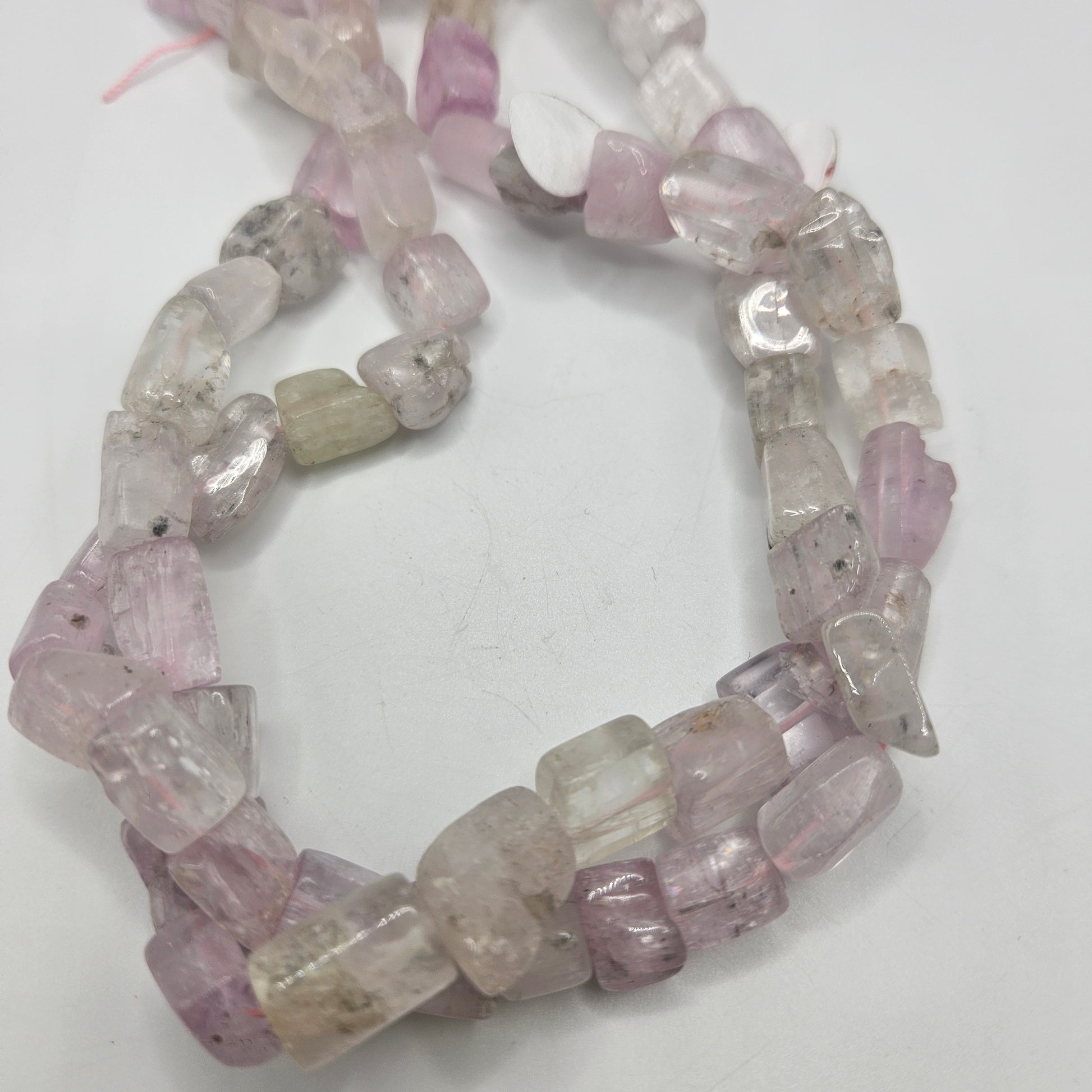 10mm kunzite chunk bead strand.