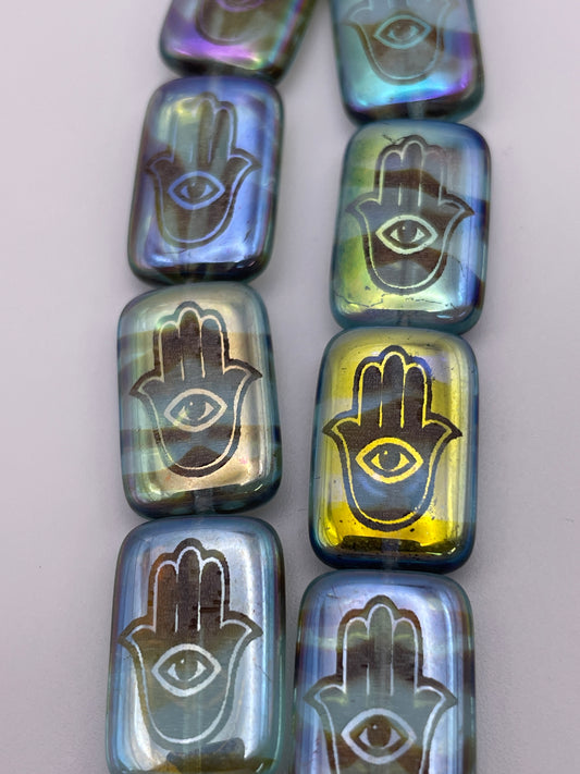 12 by 18mm Semi Transparent Hamsa Hand Czech Bead Strand.