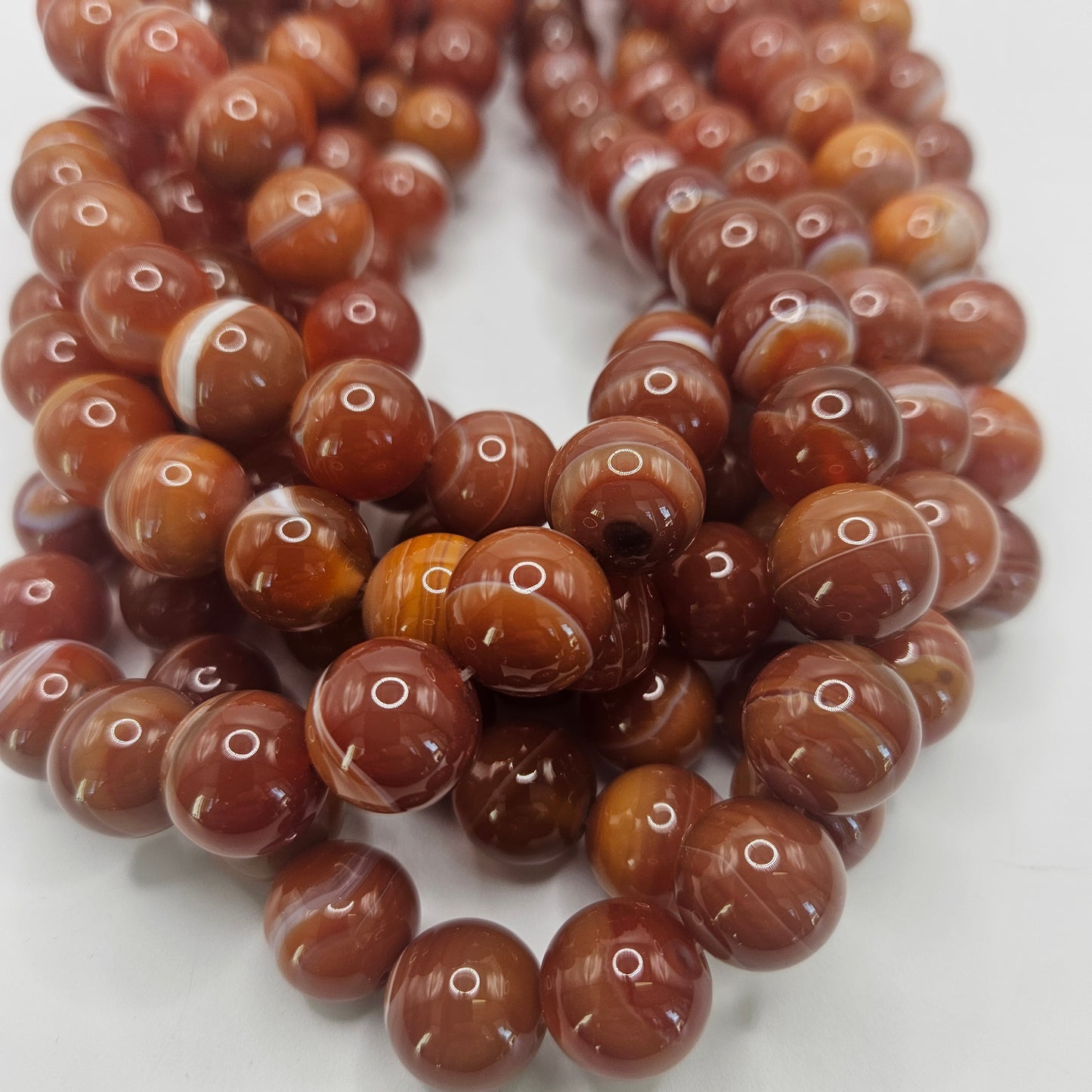 12mm carnelian round smooth bead strand.