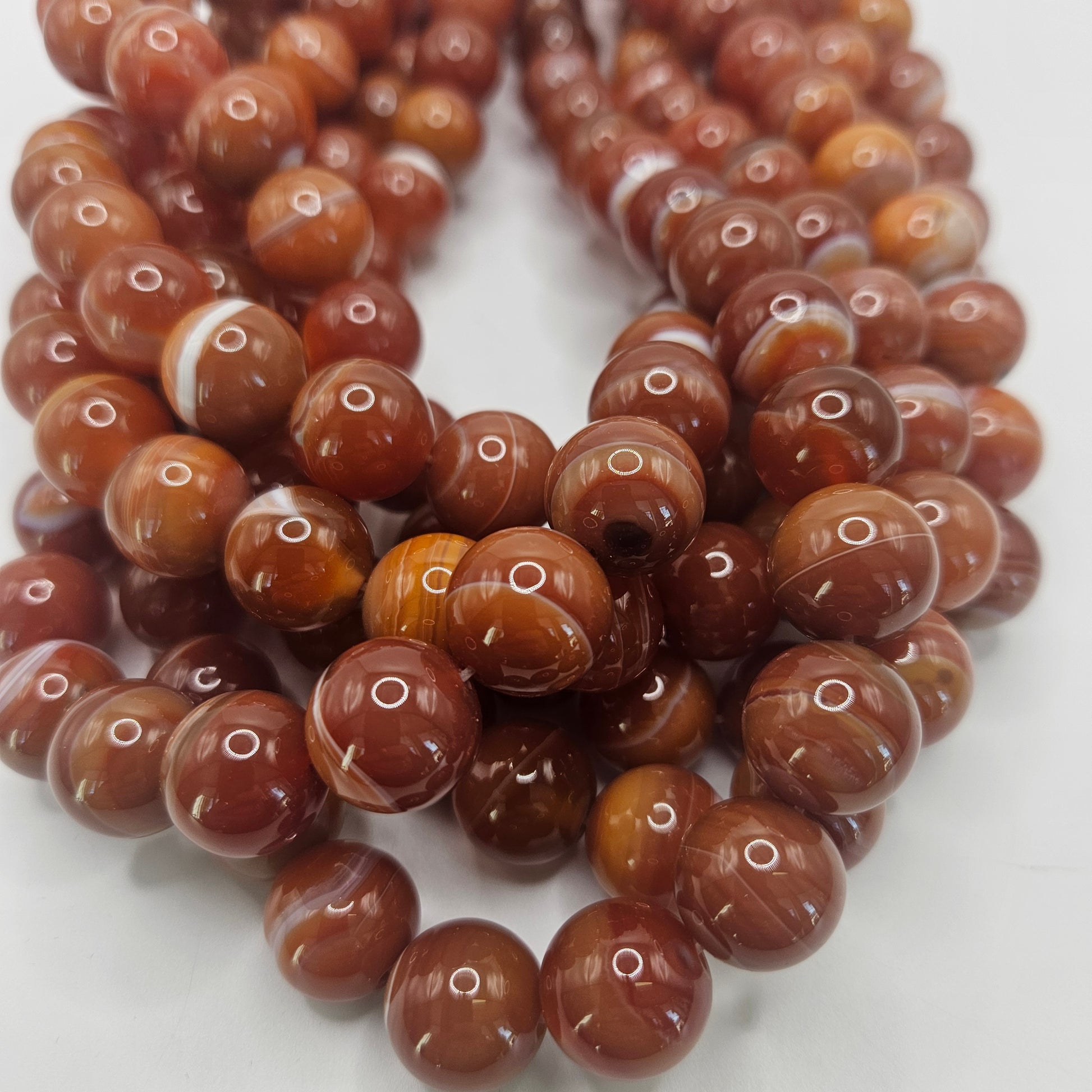 12mm carnelian round smooth bead strand.