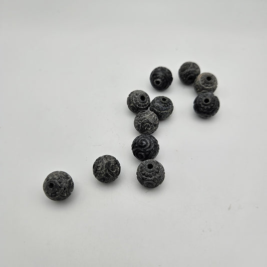 12mm Carved Black Jade Guru Bead.