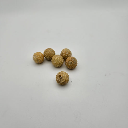 12mm Carved Yellow Jade Guru Bead.