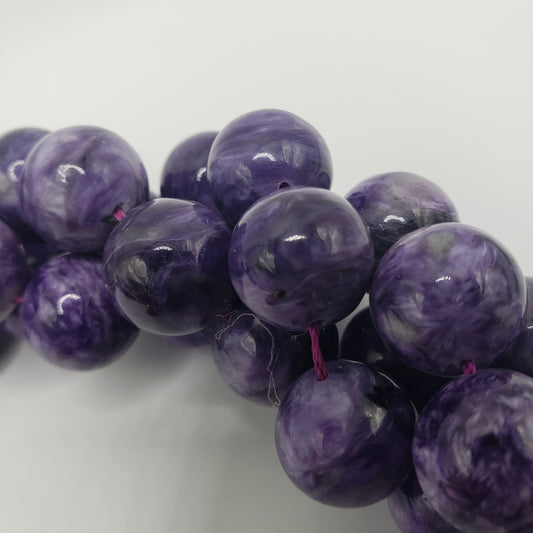 15 Inch Strand of 12mm Charoite Round Beads.