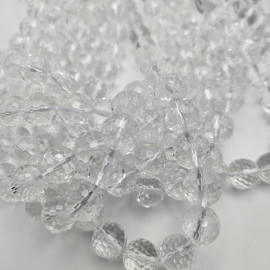 12mm Clear Quartz Faceted Round Bead Strand.