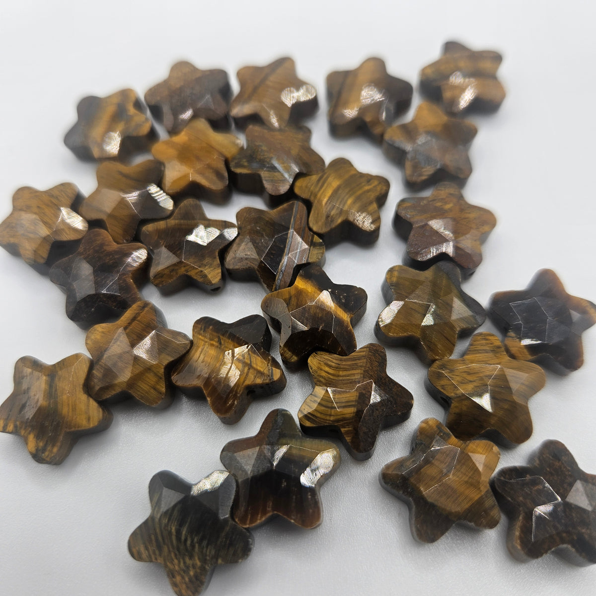 12mm Faceted Tiger Eye Star Single Bead.