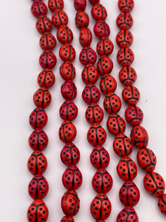 12mm Ladybug Czech Bead Strand.