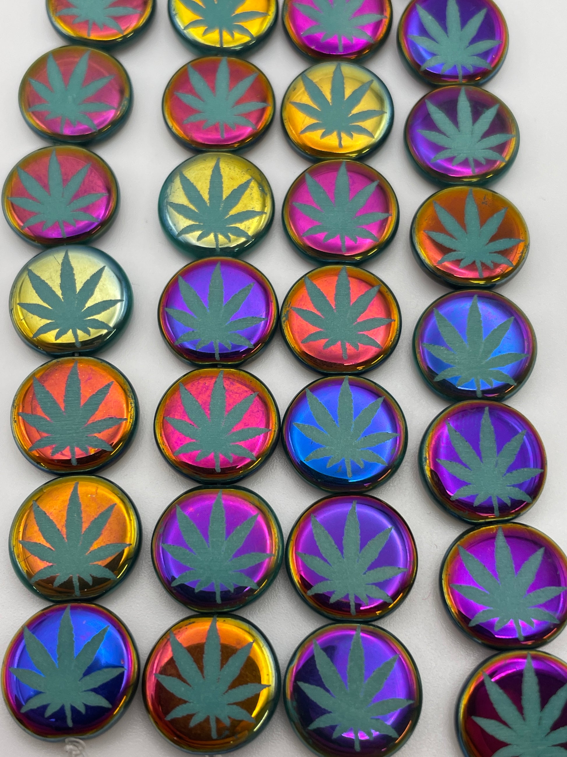 13mm Marijuana Leaf Czech Bead Strand.