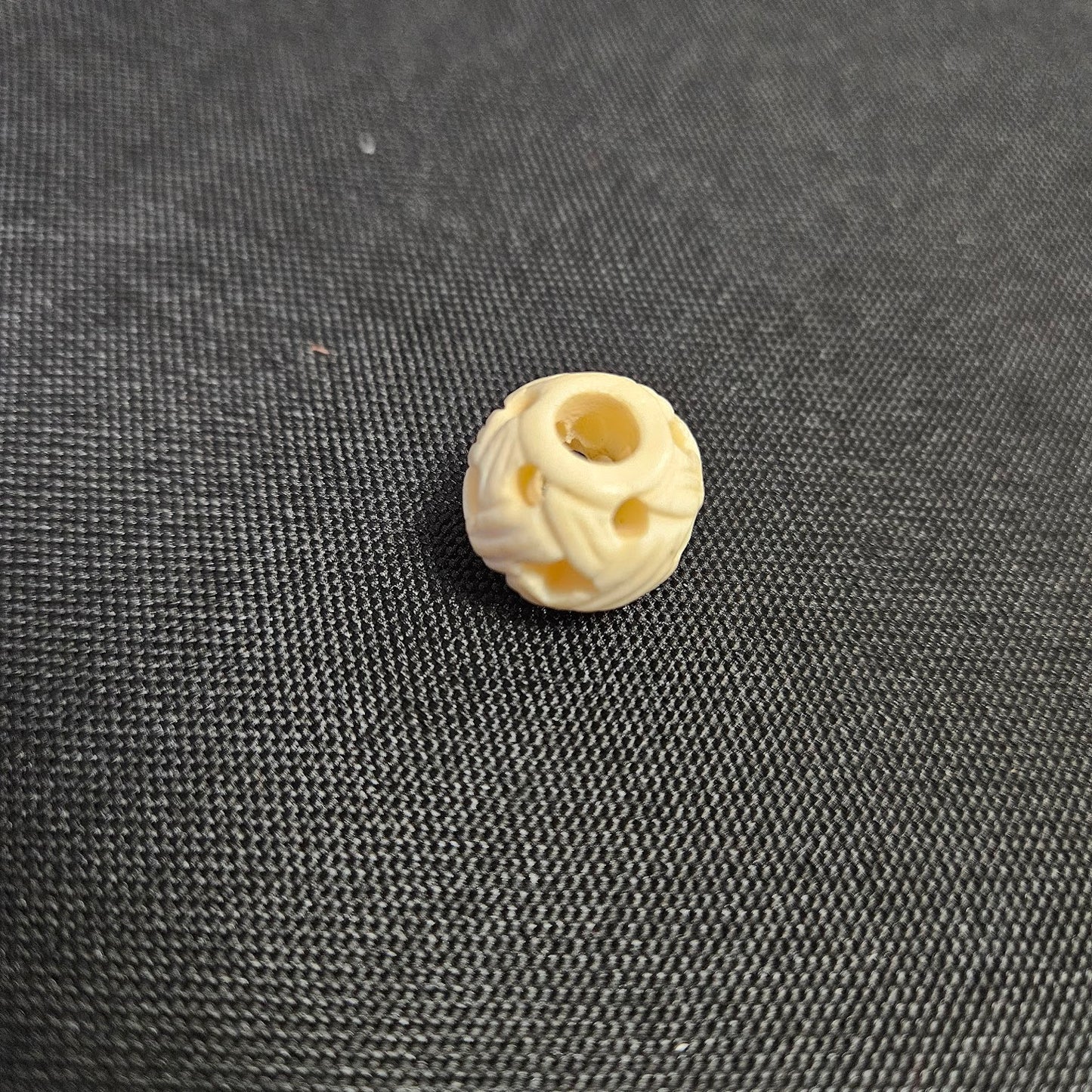 White Woven Carved Bone Bead Strand.