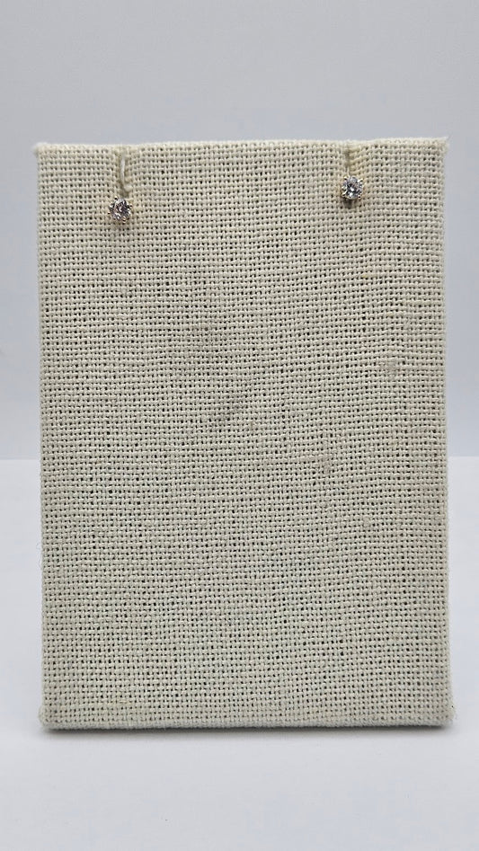 14k Gold Diamond Studs.