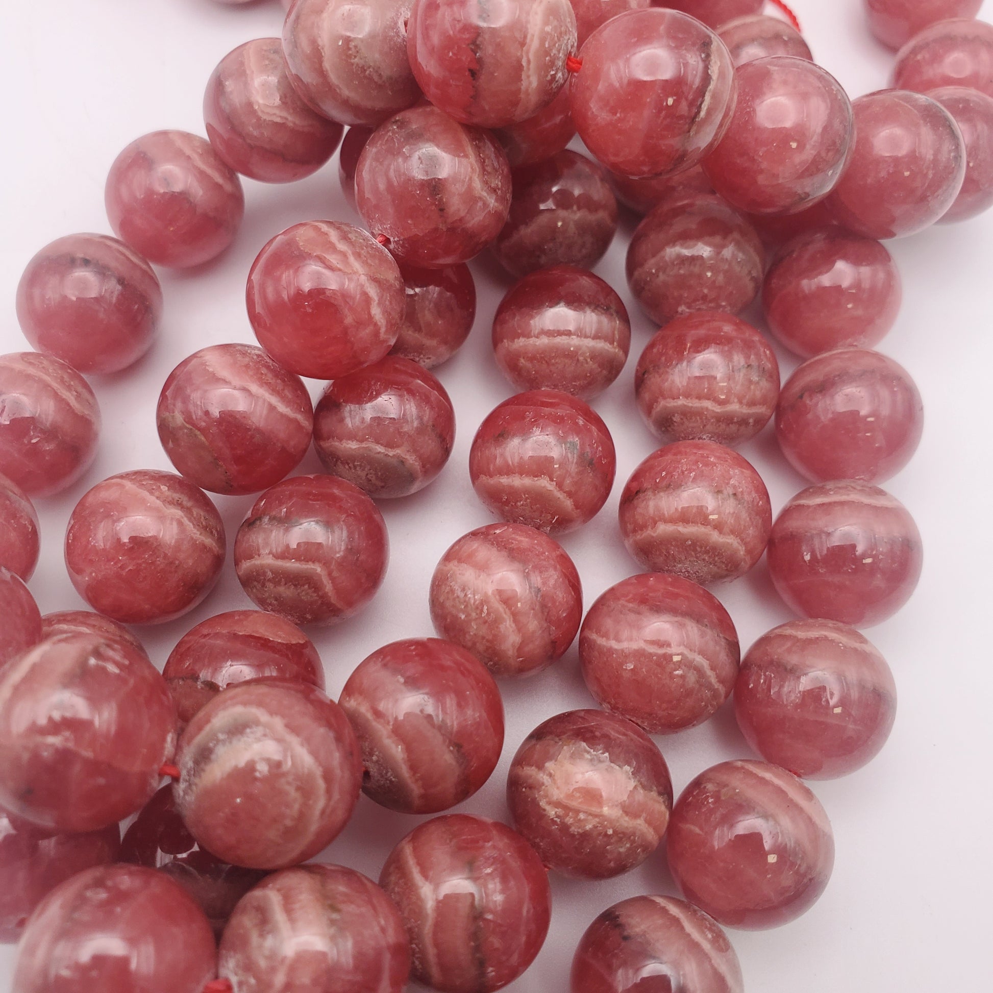 14mm Rhodochrosite Round, Smooth Bead Strand.