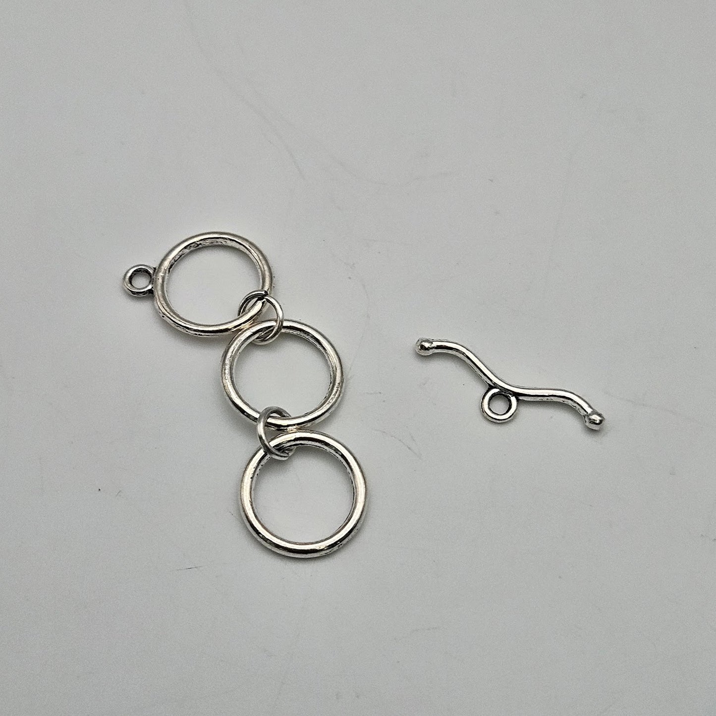 14mm Silver Colored Pewter Wavy Triple Toggle.