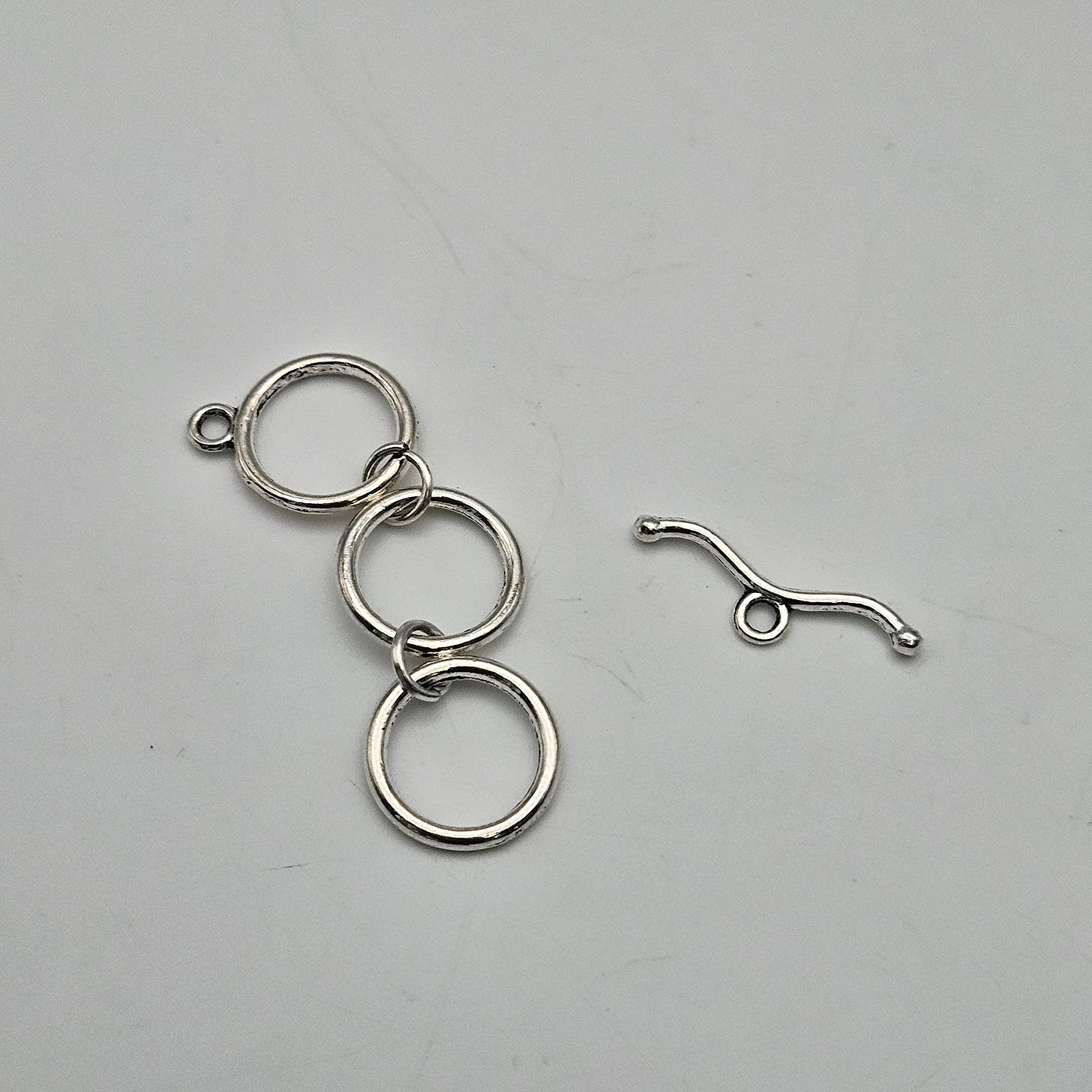 14mm Silver Colored Pewter Wavy Triple Toggle.