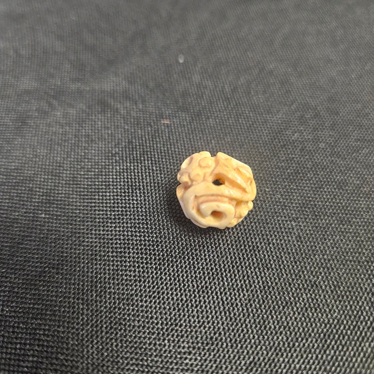 14mm Swirl Carved Bone Bead Strand.