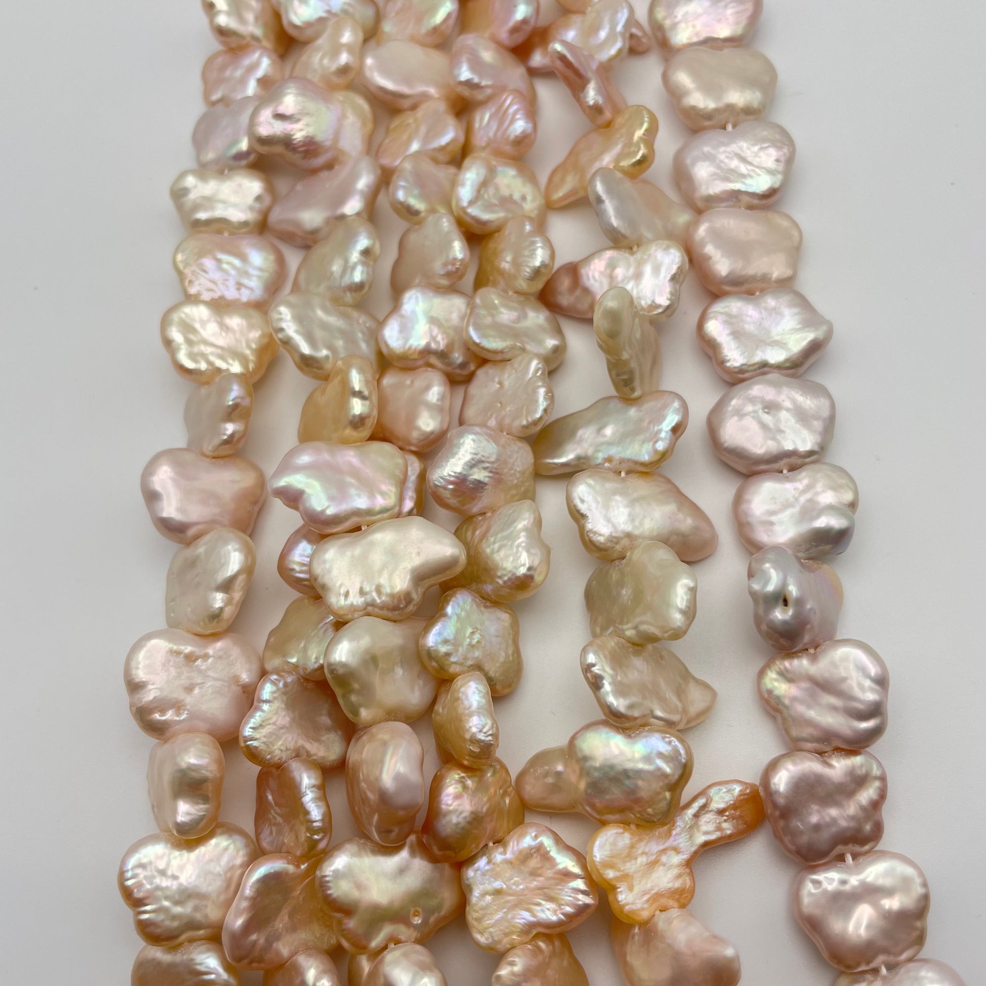 14mm Pink Pearl Puff Strand.