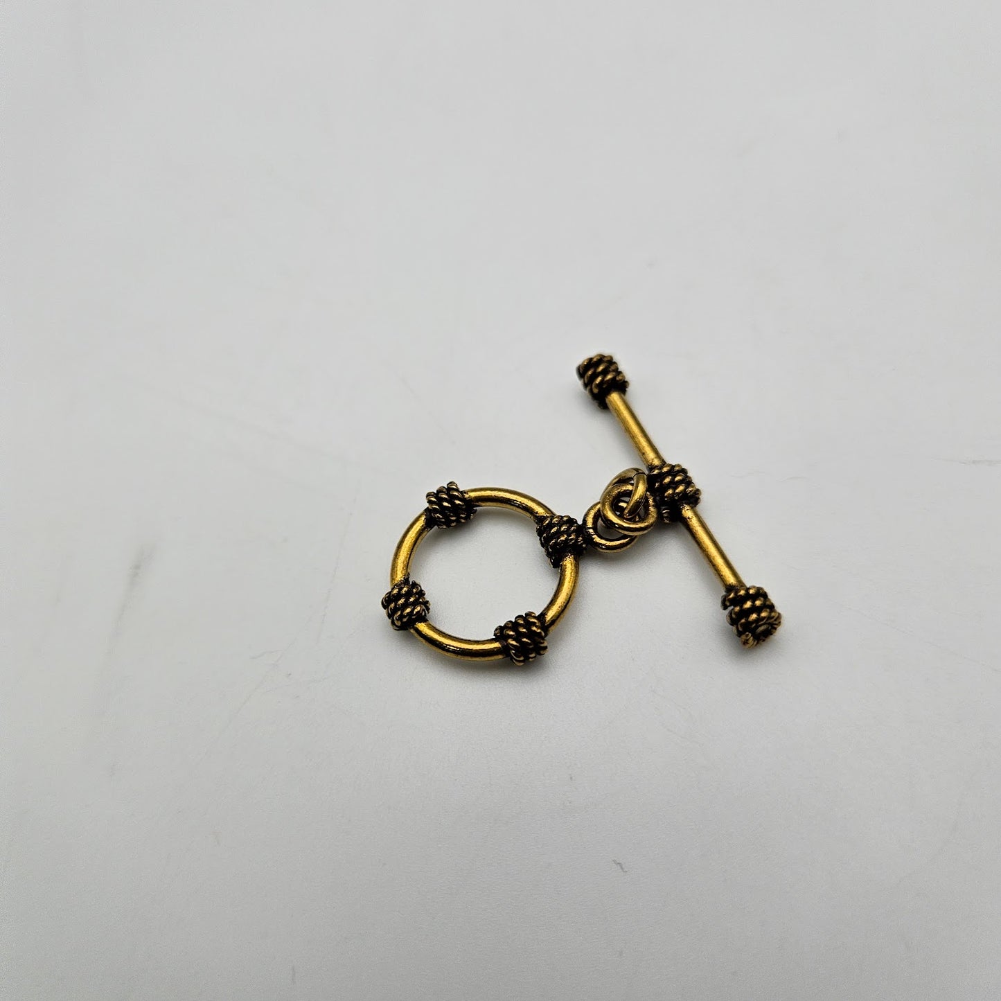 16mm Gold Colored Pewter Rope Toggle.