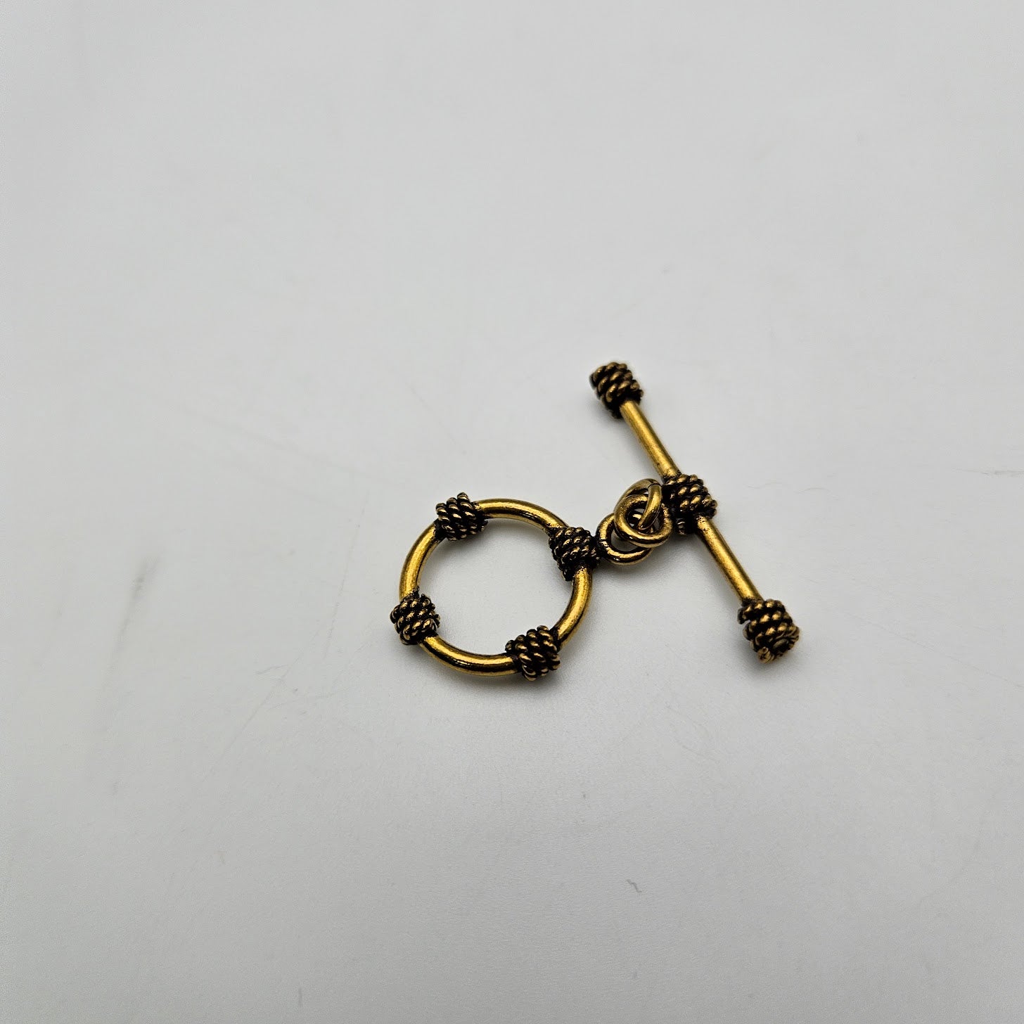 16mm Gold Colored Pewter Rope Toggle.