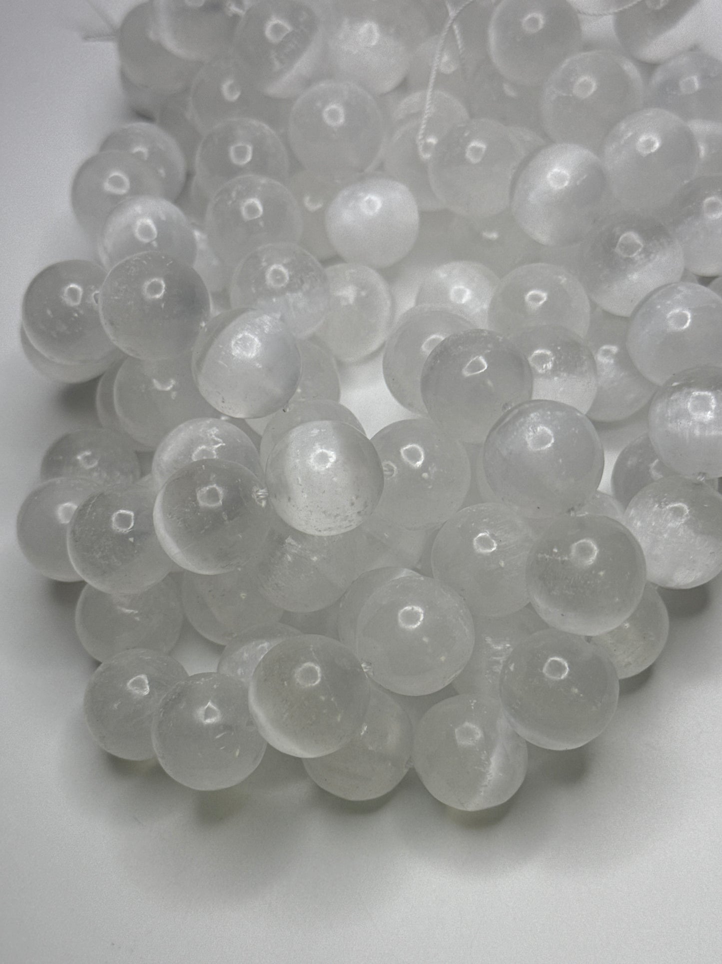 16mm Selenite Round Smooth.