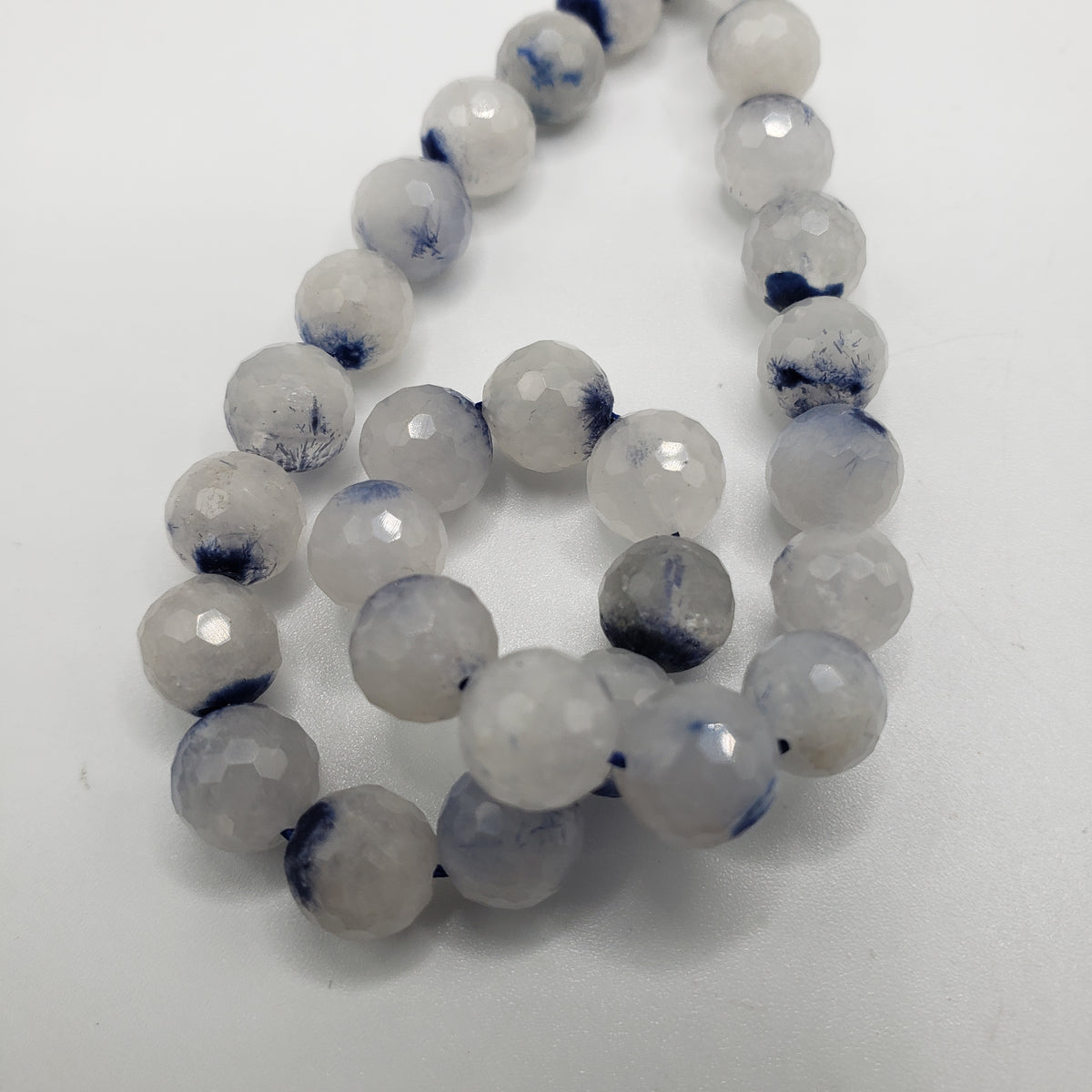 6mm Dumortierite in Quartz Faceted