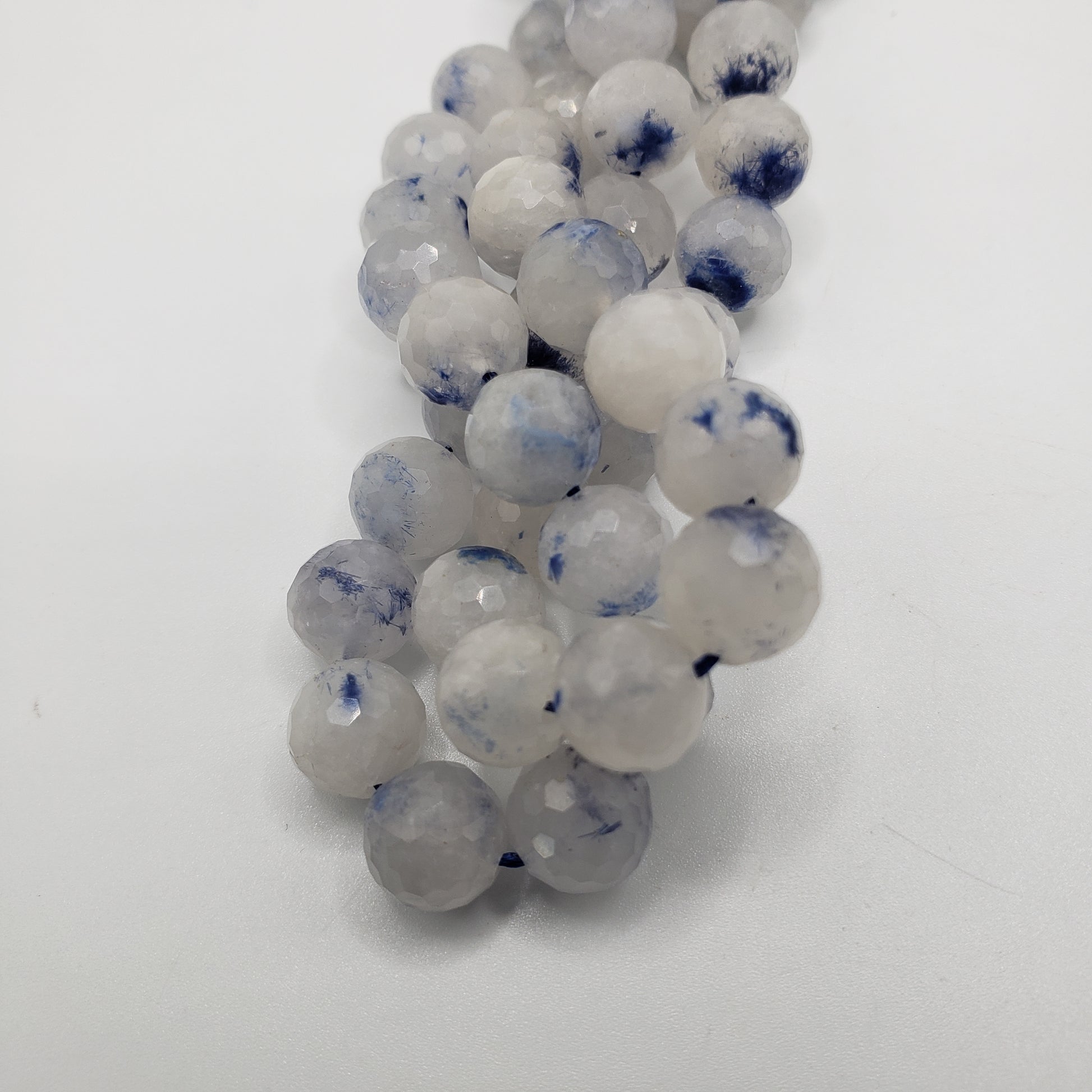 8mm Dumortierite in Quartz Faceted