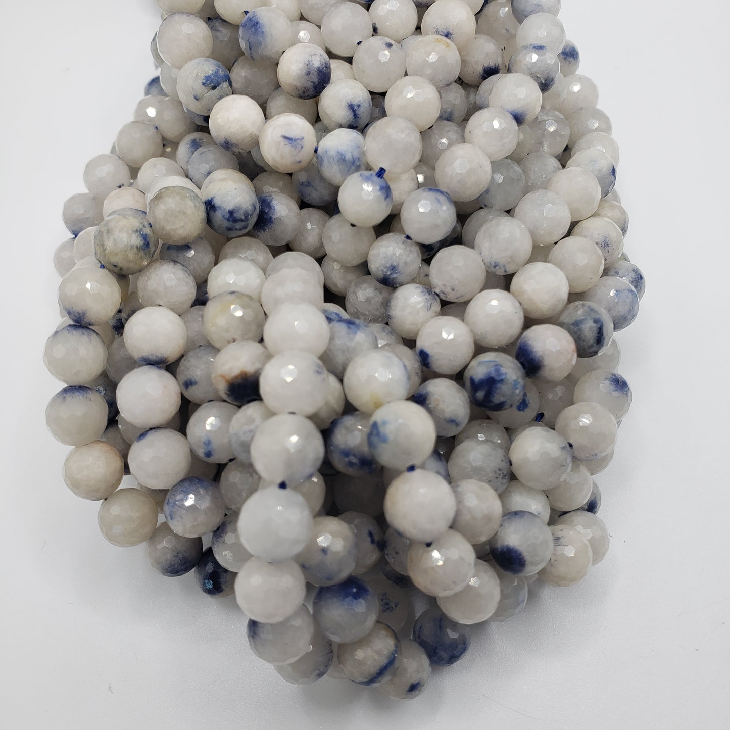 9mm Dumortierite in Quartz Faceted
