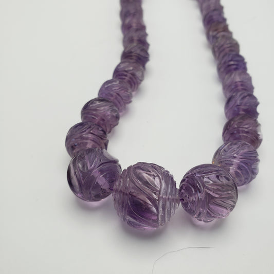 Amethyst Carved Strand