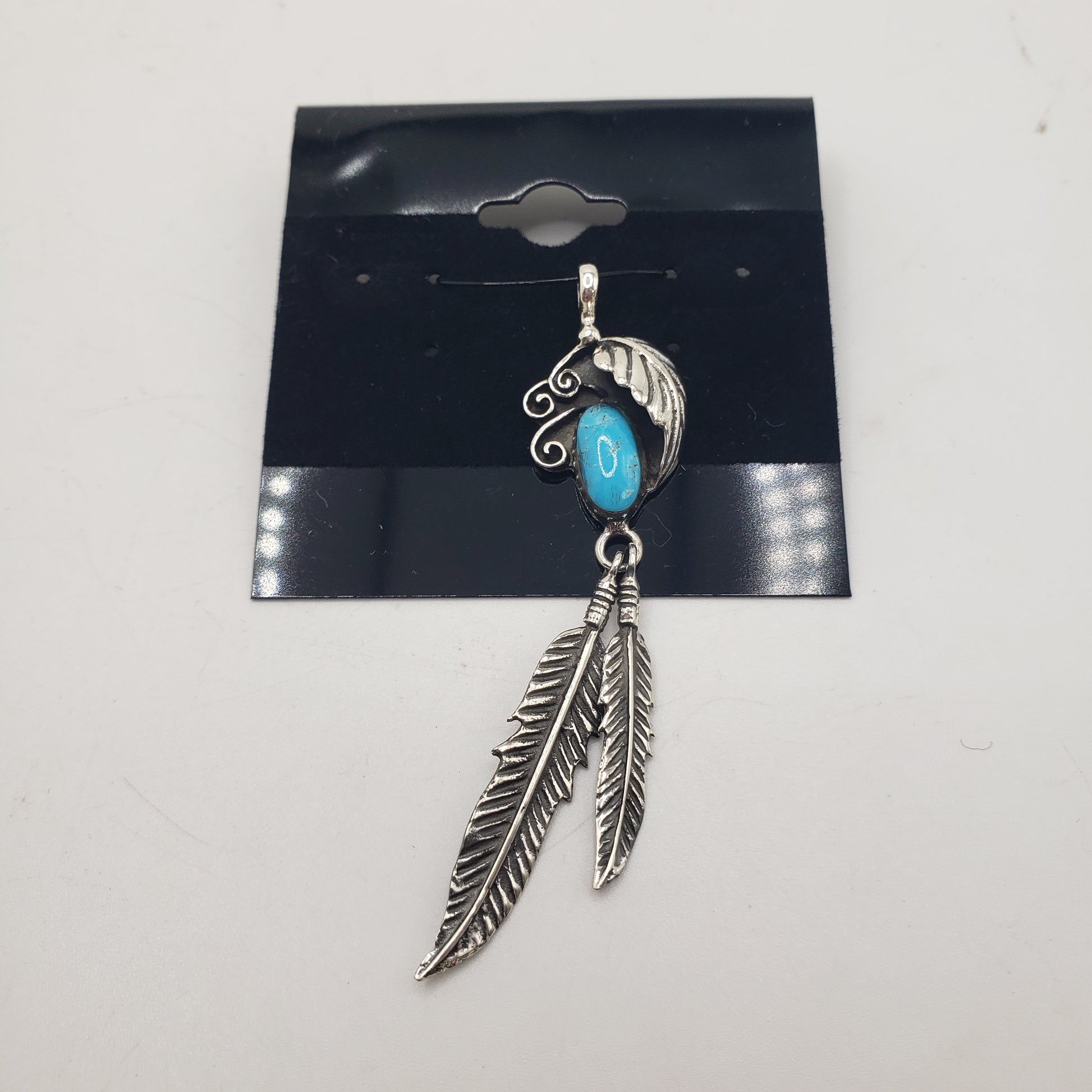 SS Turquoise & Feather Pendant 36.99