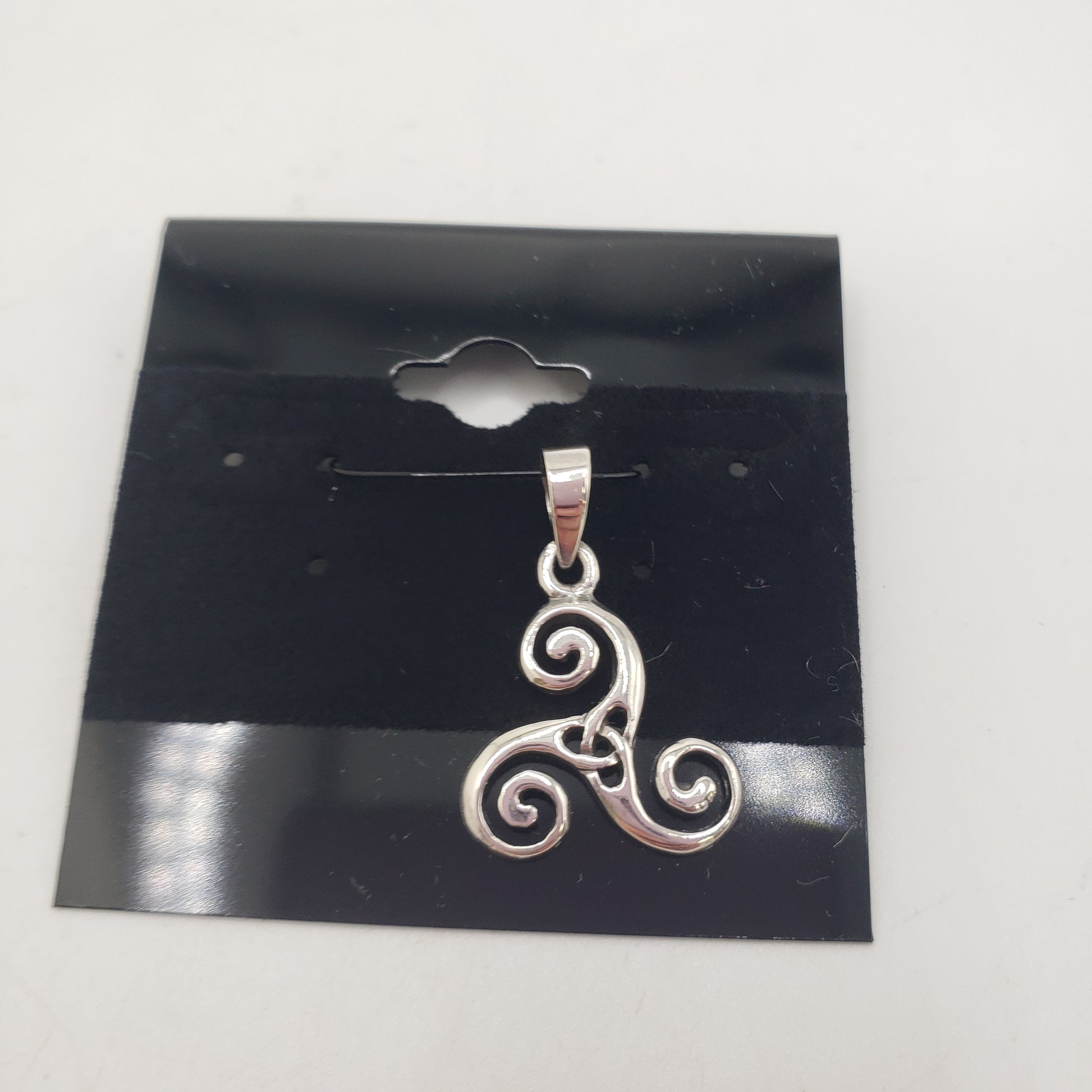 This image features a stylish SS Triskelion Pendant