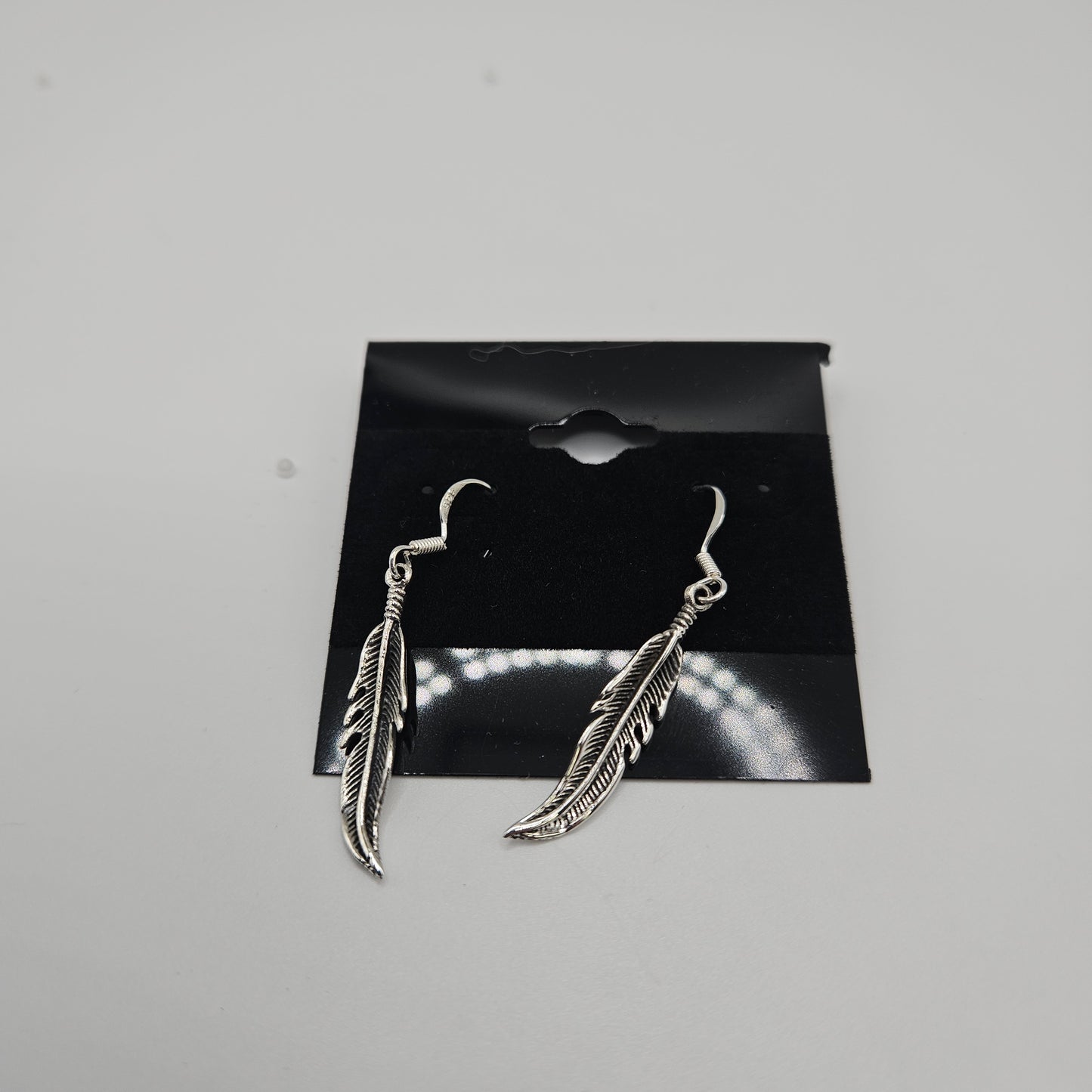 SS Single Feather Earrings 28.99