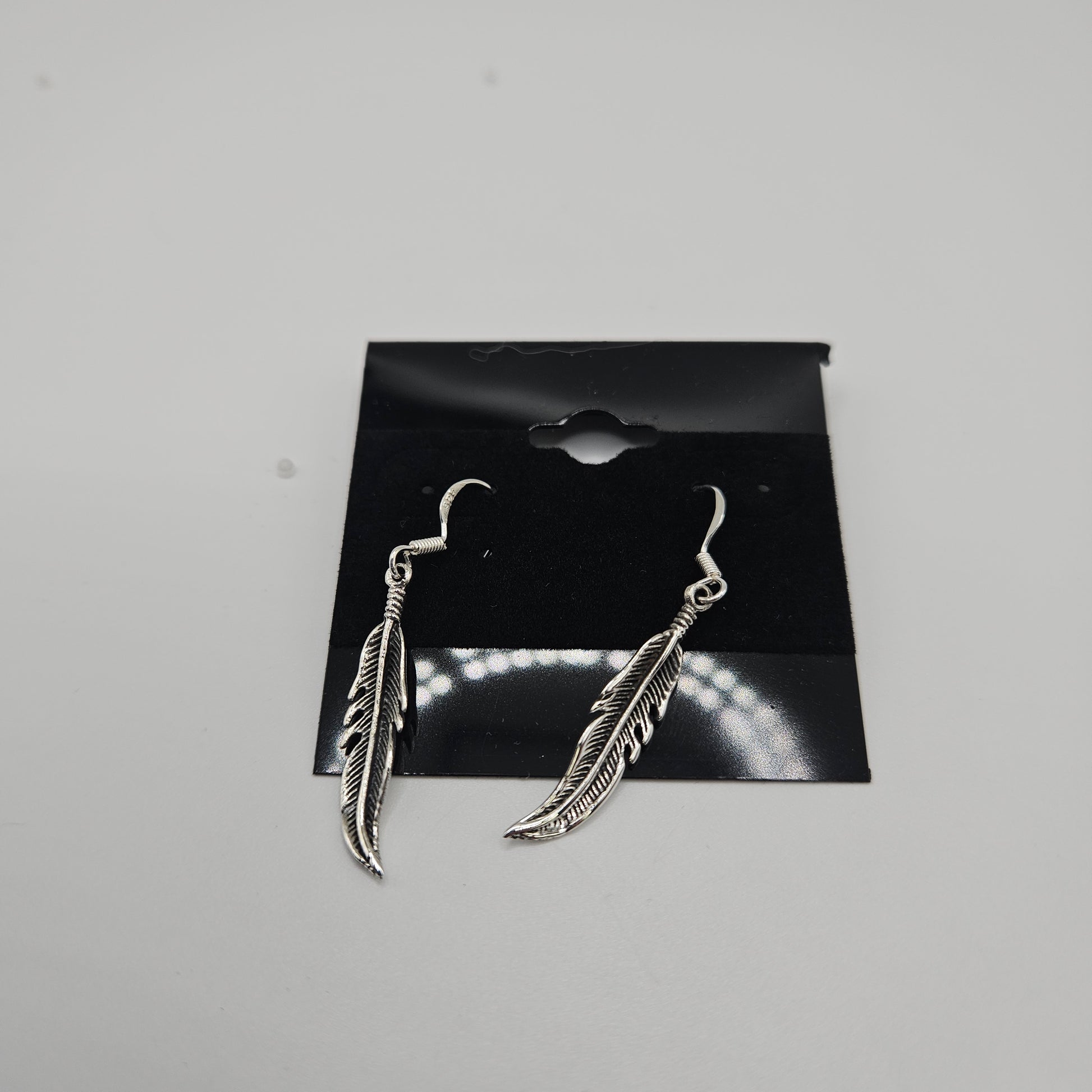 SS Single Feather Earrings 28.99