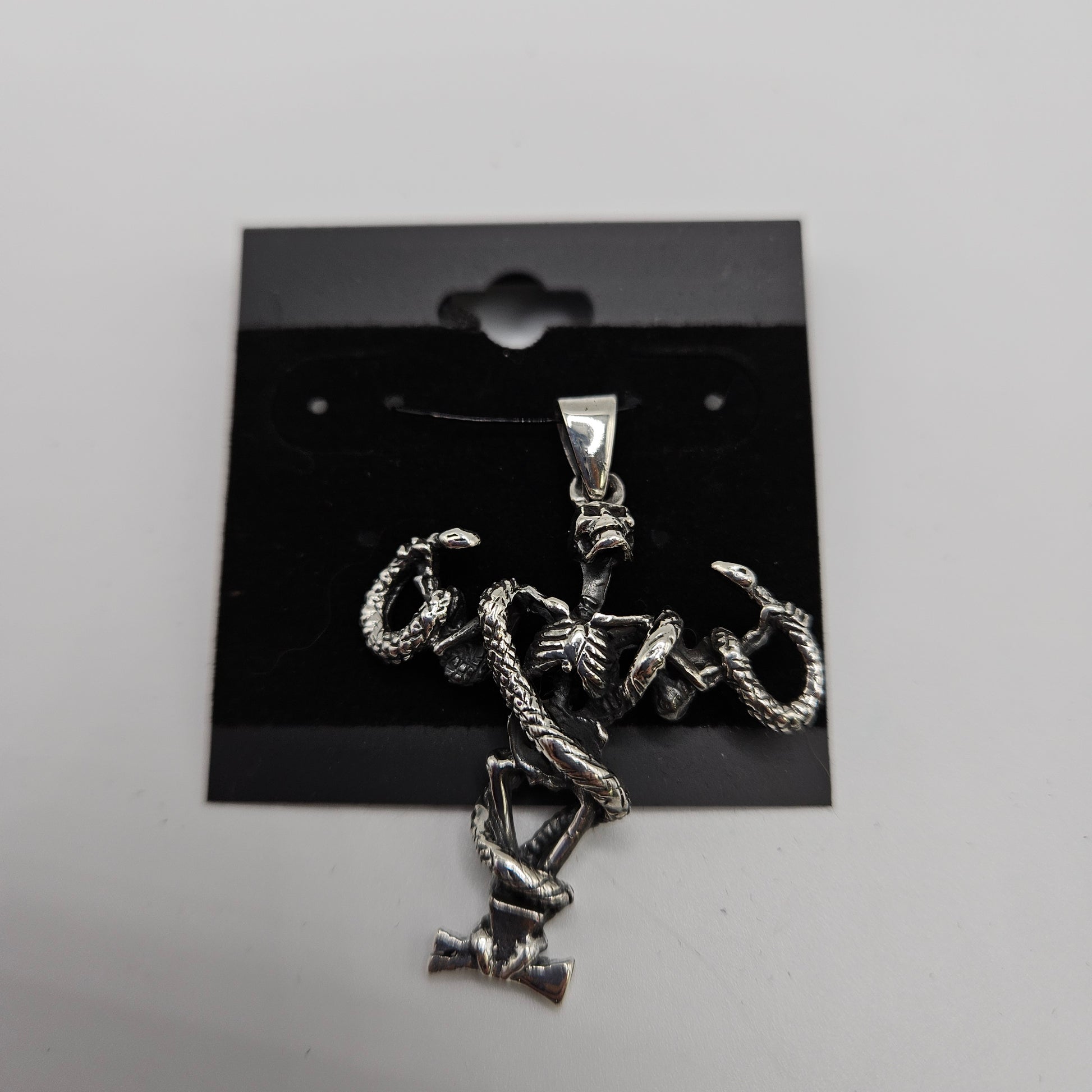 SS Skeletal & Snake Cross Pendant 73.99