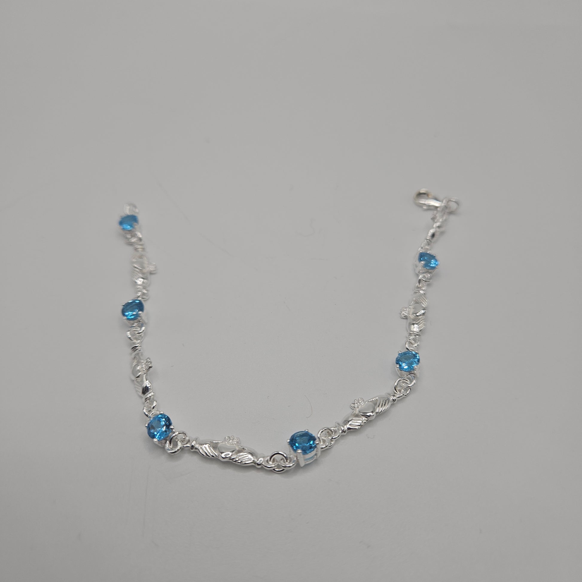 SS Blue Topaz Hands & Heart Bracelet 112.99
