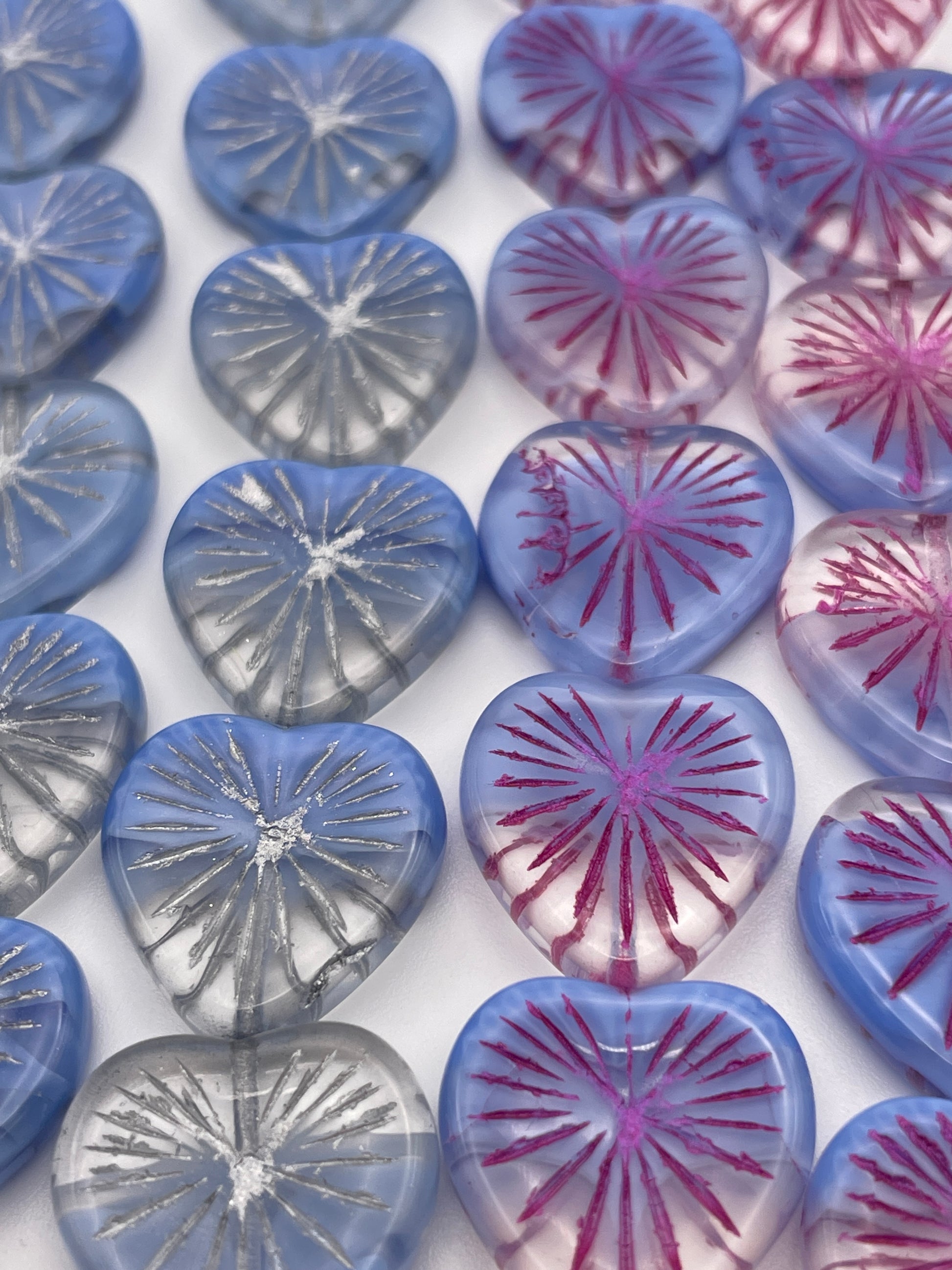 17mm Blue Heart Starburst Pattern Czech Bead Strand.