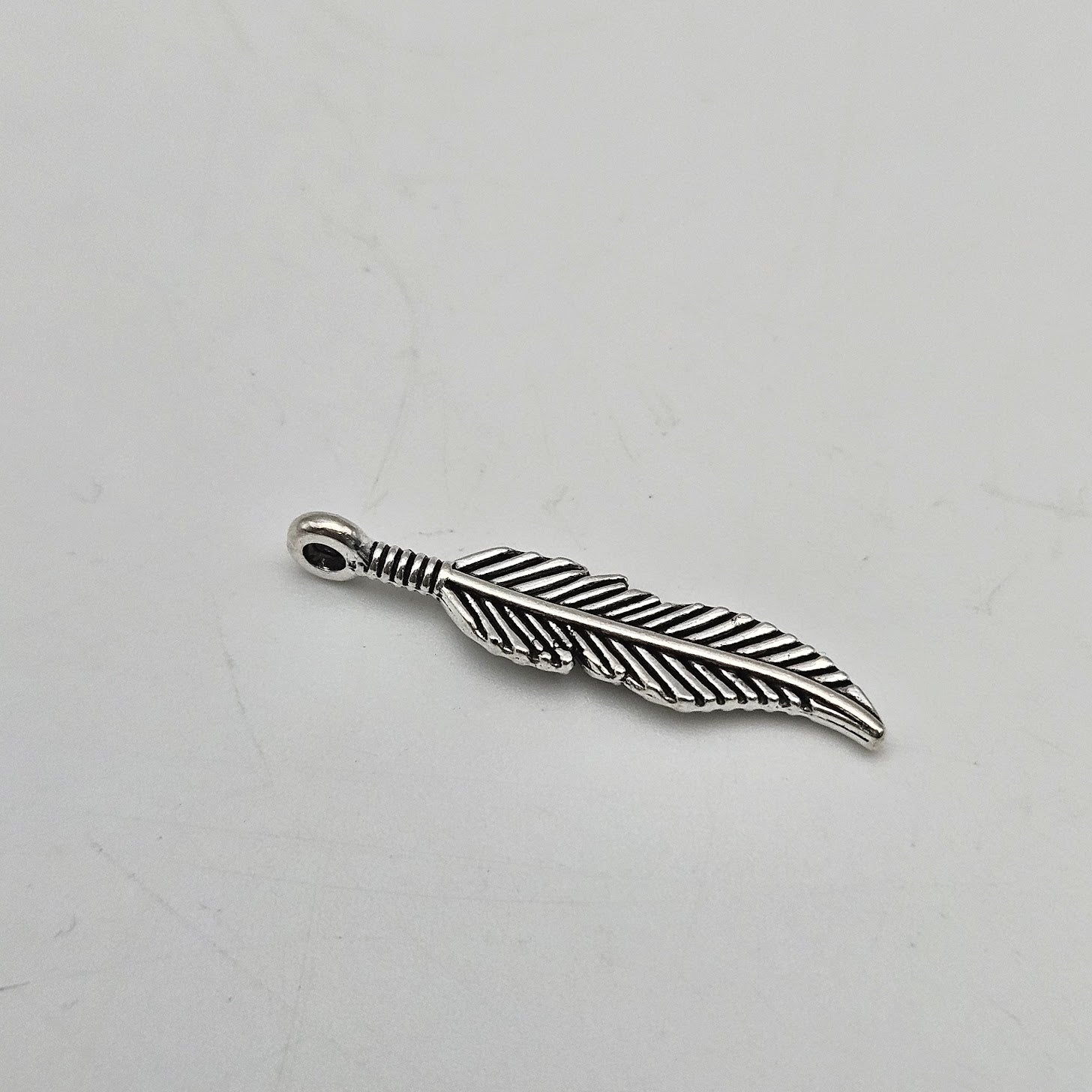 1in Silver Colored Pewter Feather.