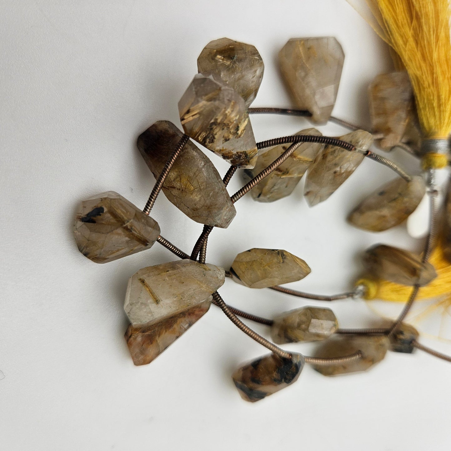 Assorted Gold Rutilated Quartz Top Drill Faceted